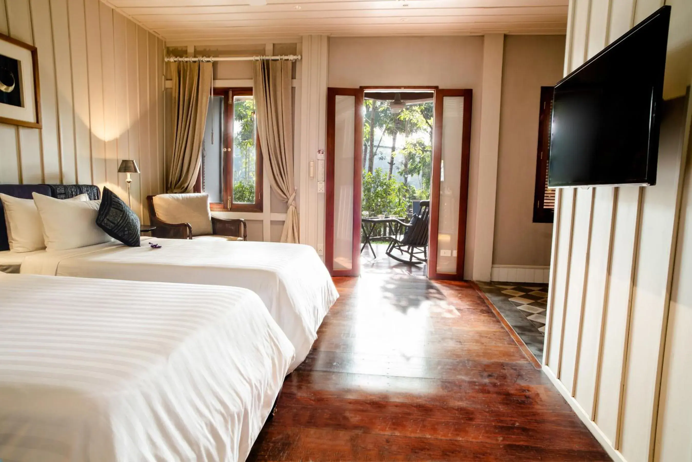 Deluxe Double or Twin with Garden View in Burasari Heritage Luang Prabang Deluxe Double or Twin with Garden View in Burasari Heritage Luang Prabang