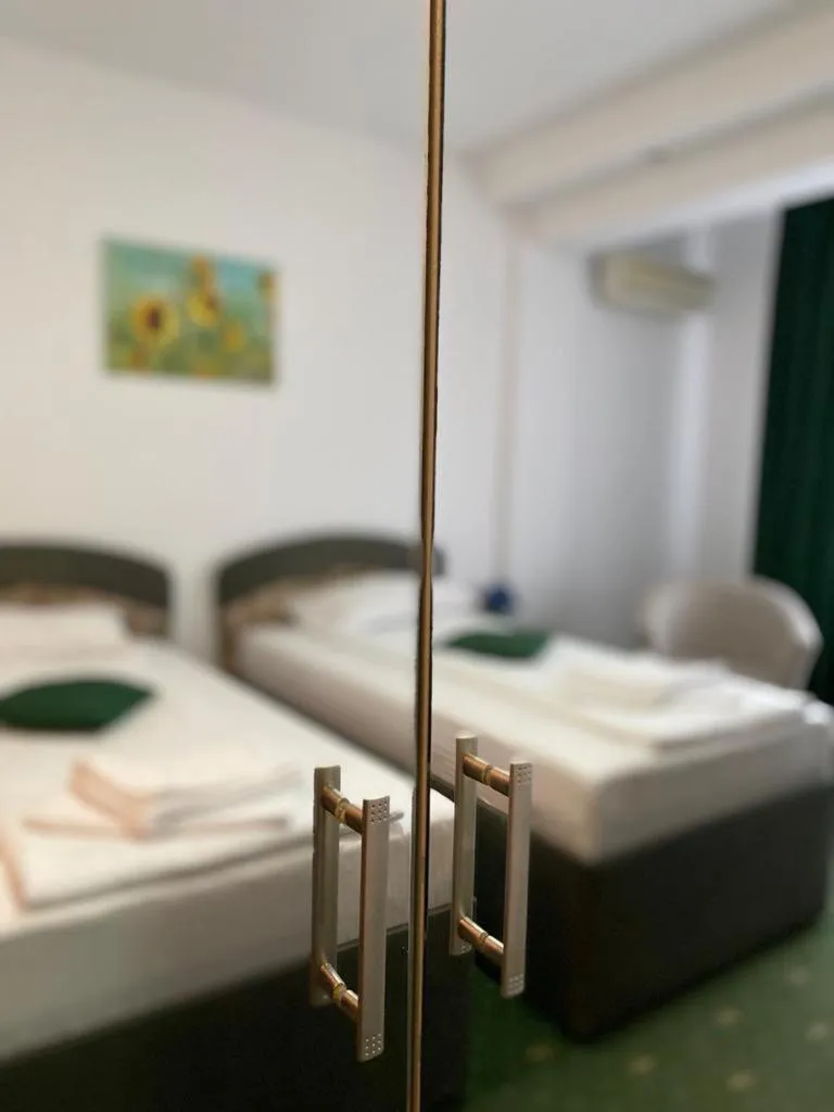 Photo of the whole room, Bed in Hotel Pami