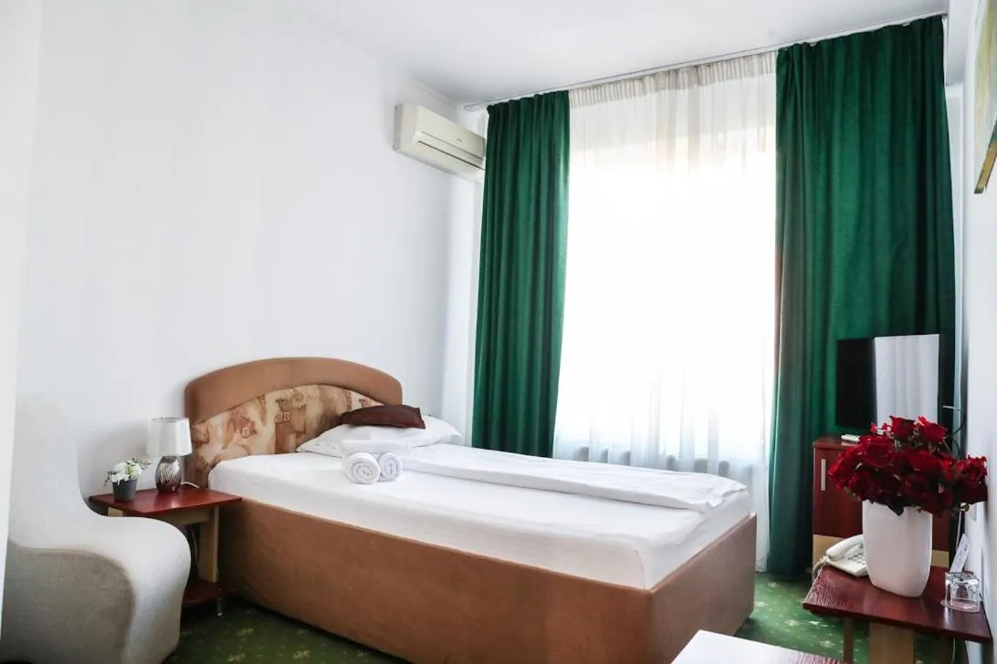 Photo of the whole room, Bed in Hotel Pami