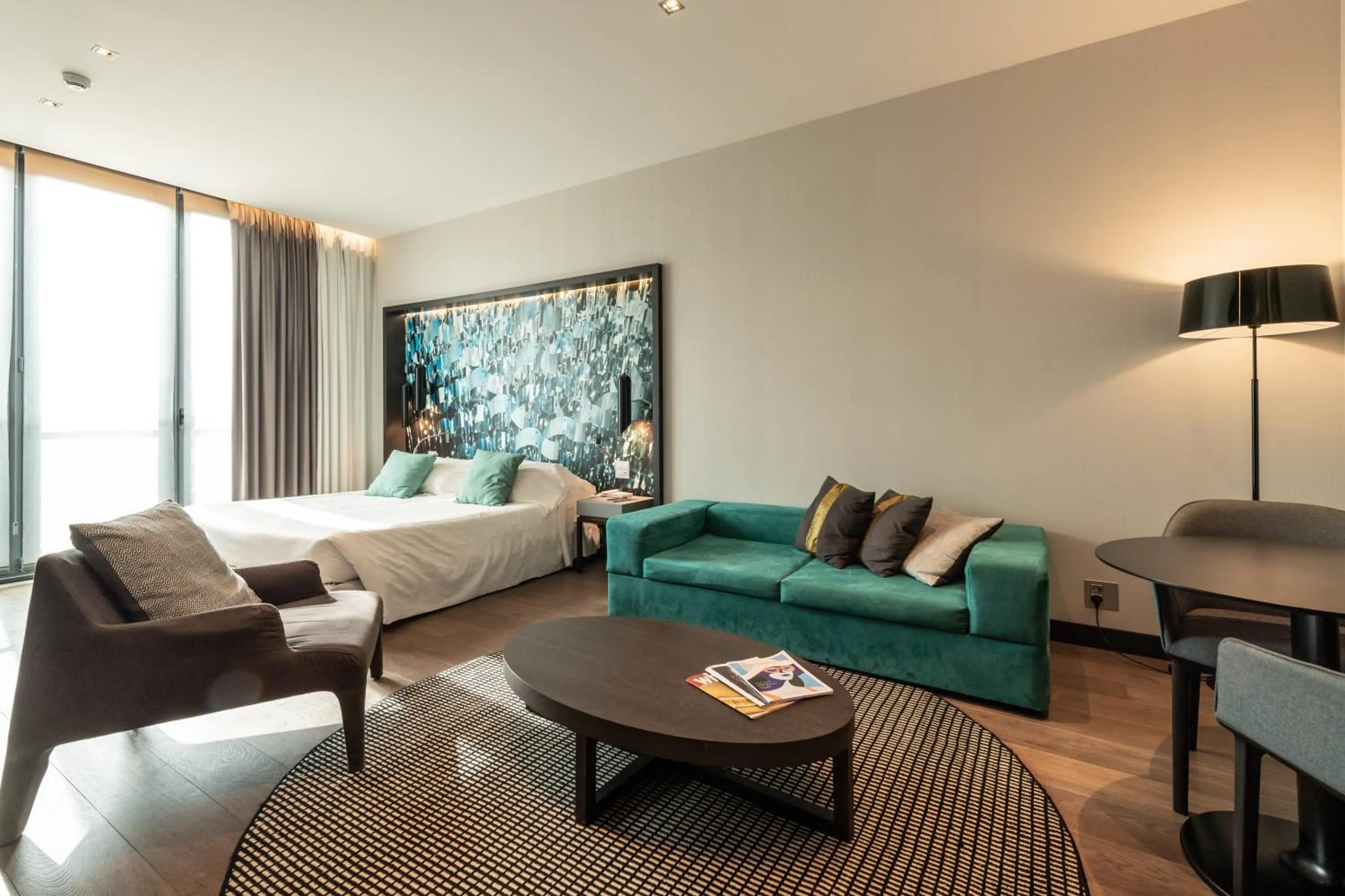 Seating area, Bed in DUPARC Contemporary Suites