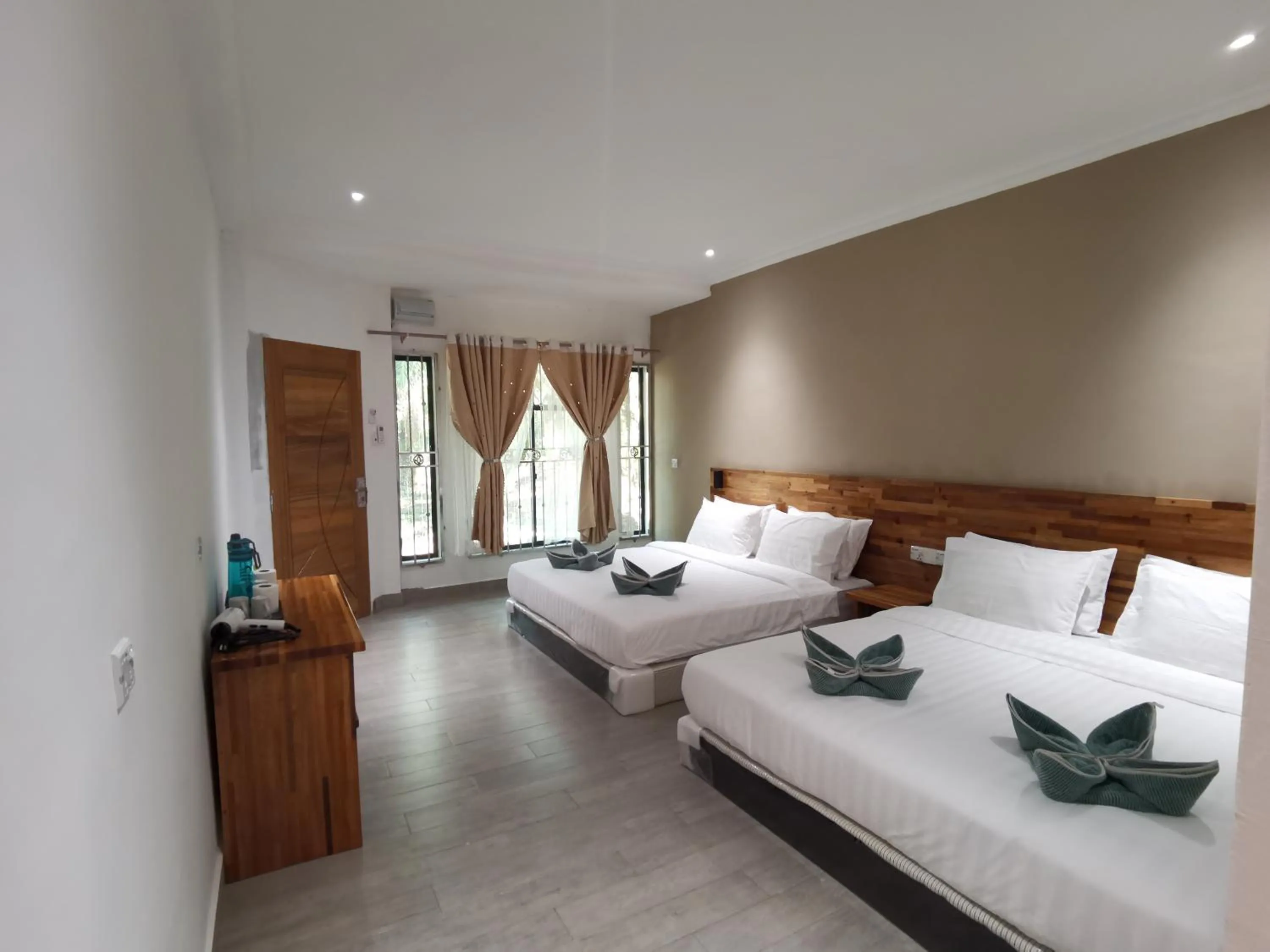 Bed in Hemingway Cottage 海明威度假屋