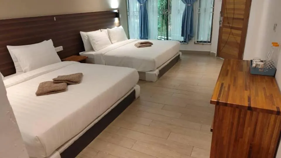 Bed in Hemingway Cottage 海明威度假屋