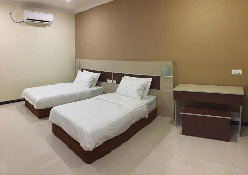 Bed in Hemingway Cottage 海明威度假屋