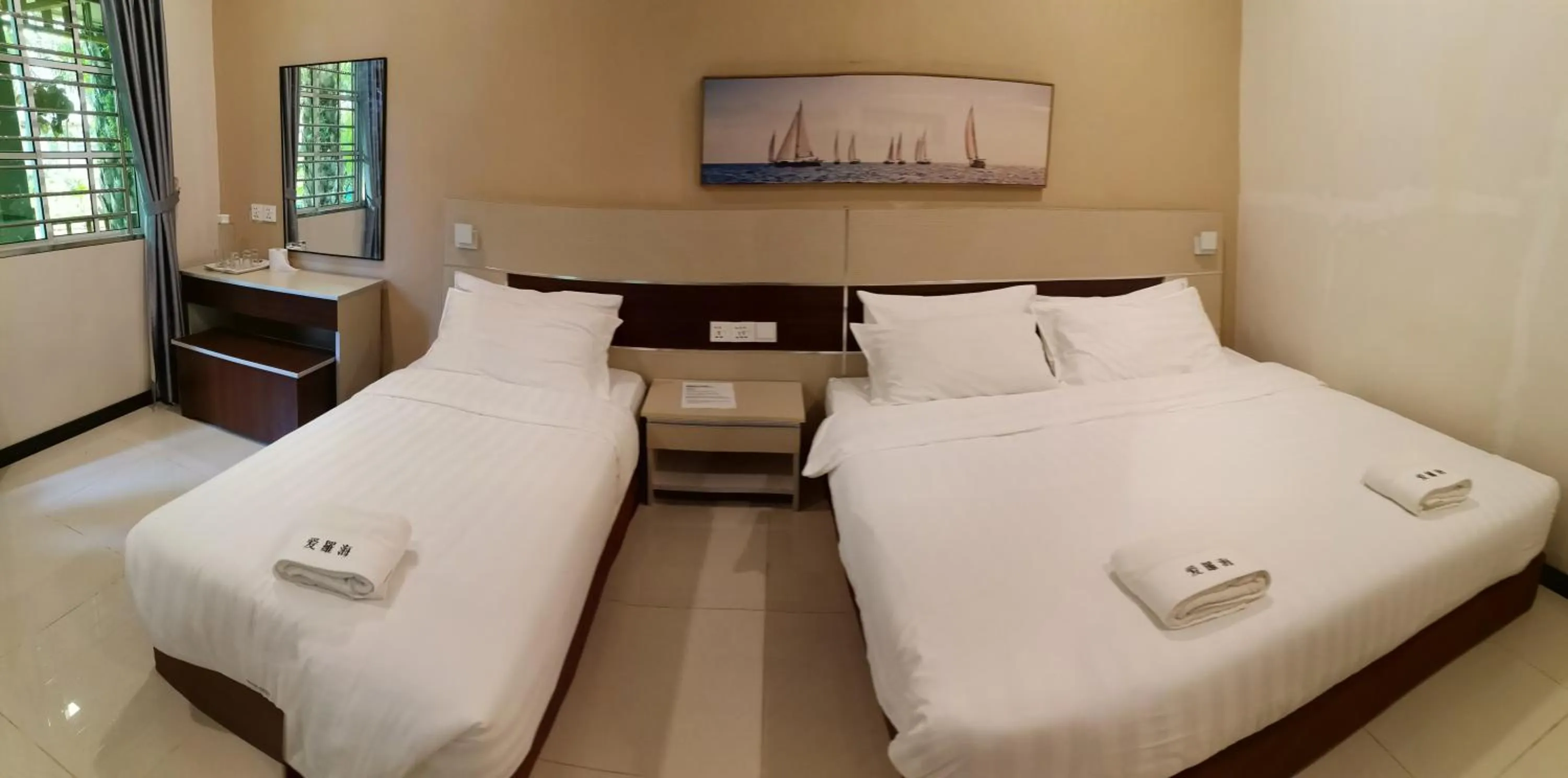 Bed in Hemingway Cottage 海明威度假屋