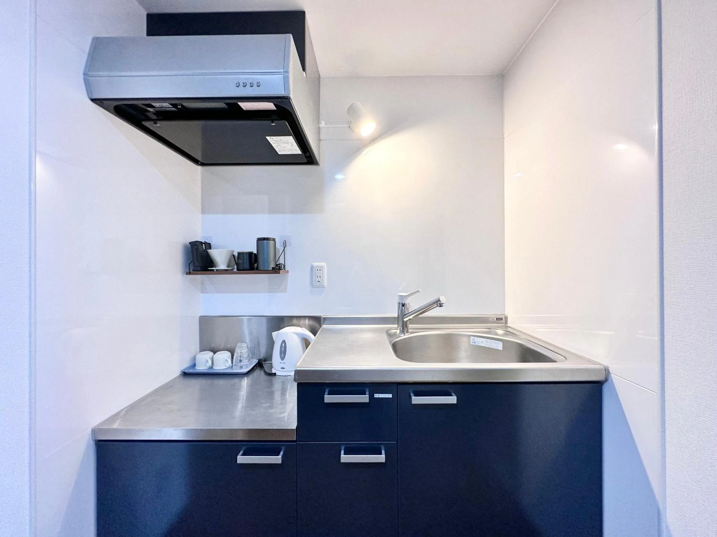 Kitchen or kitchenette in Hotel Miyakojima