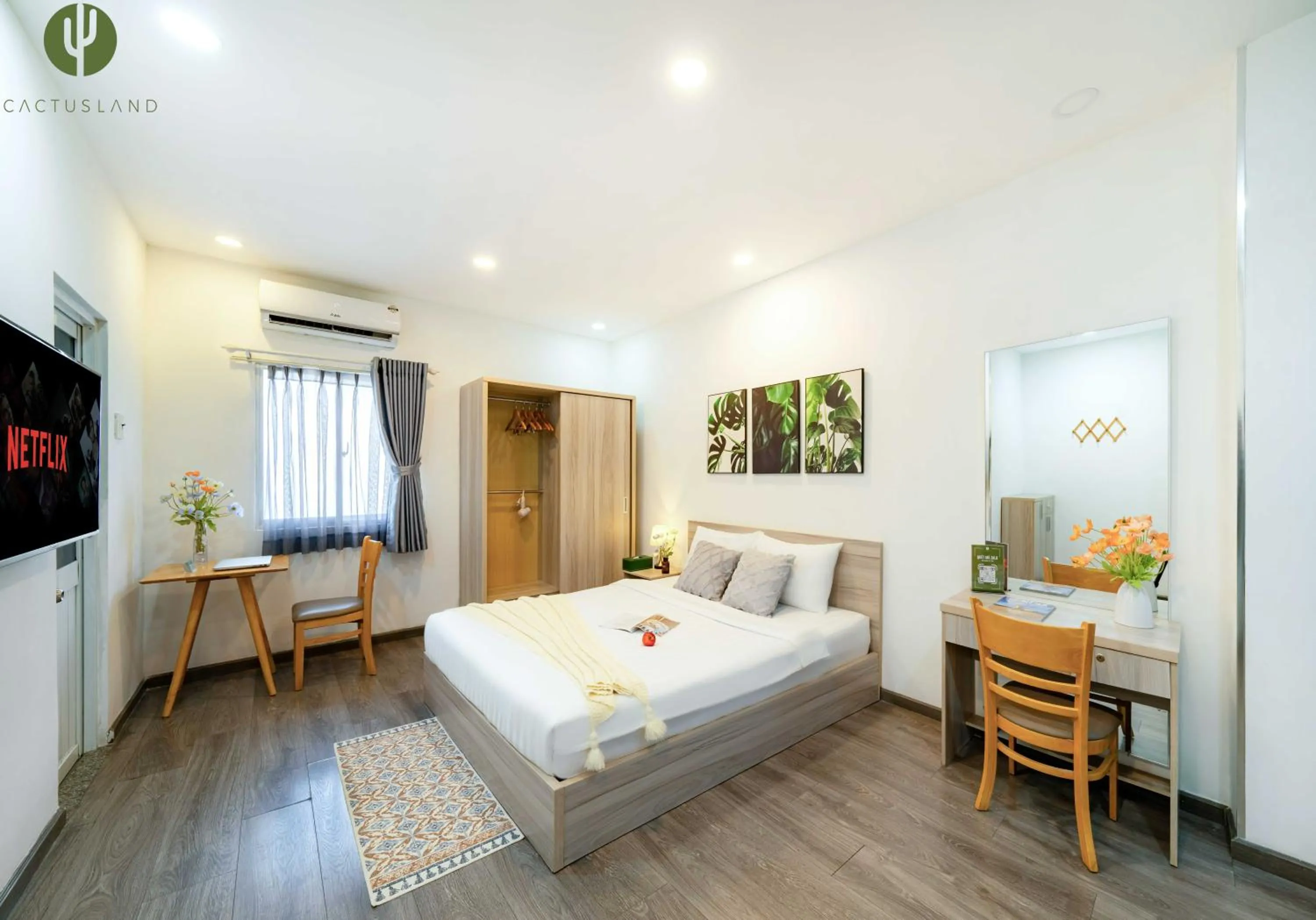 Bed in Cactusland Hotel & Apartment