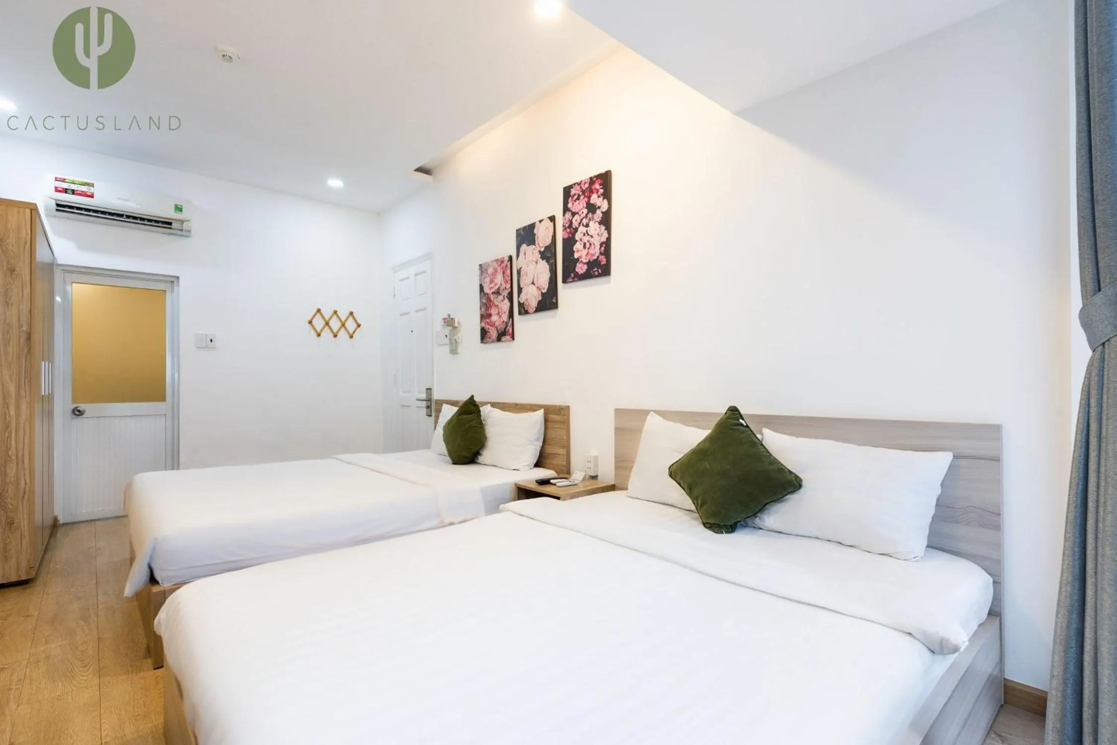 Bed in Cactusland Hotel & Apartment