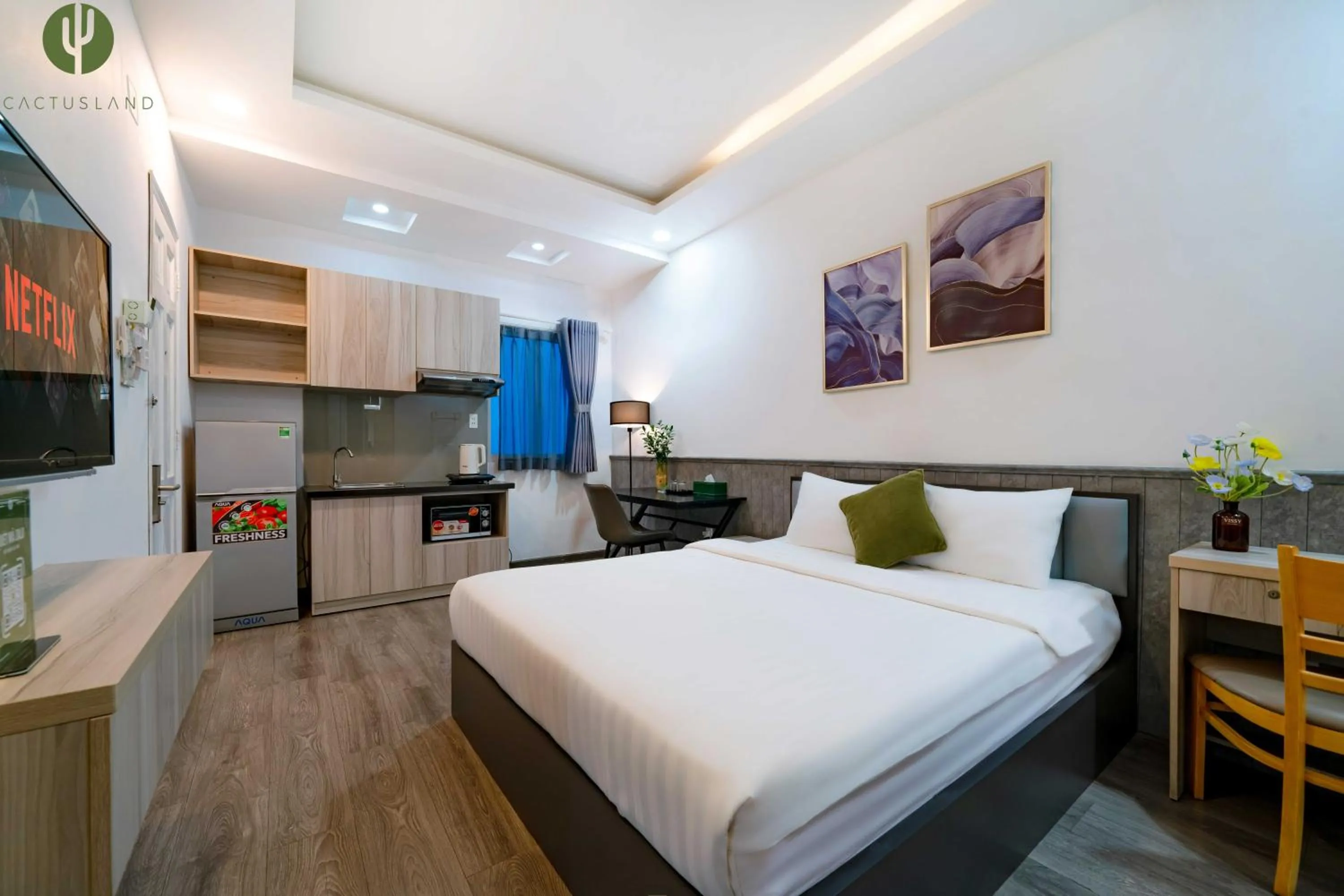 Bed in Cactusland Hotel & Apartment