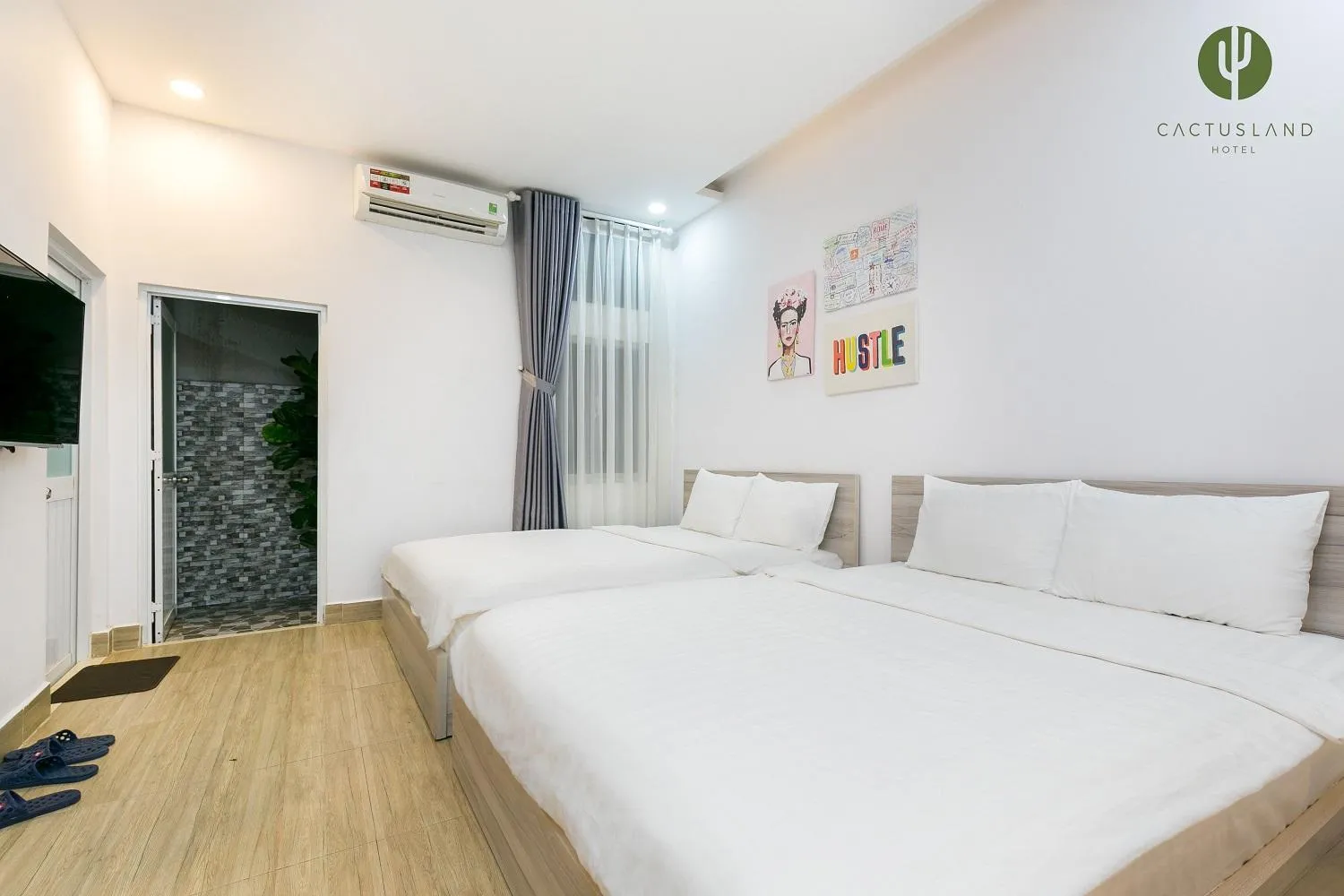 Bed in Cactusland Hotel & Apartment