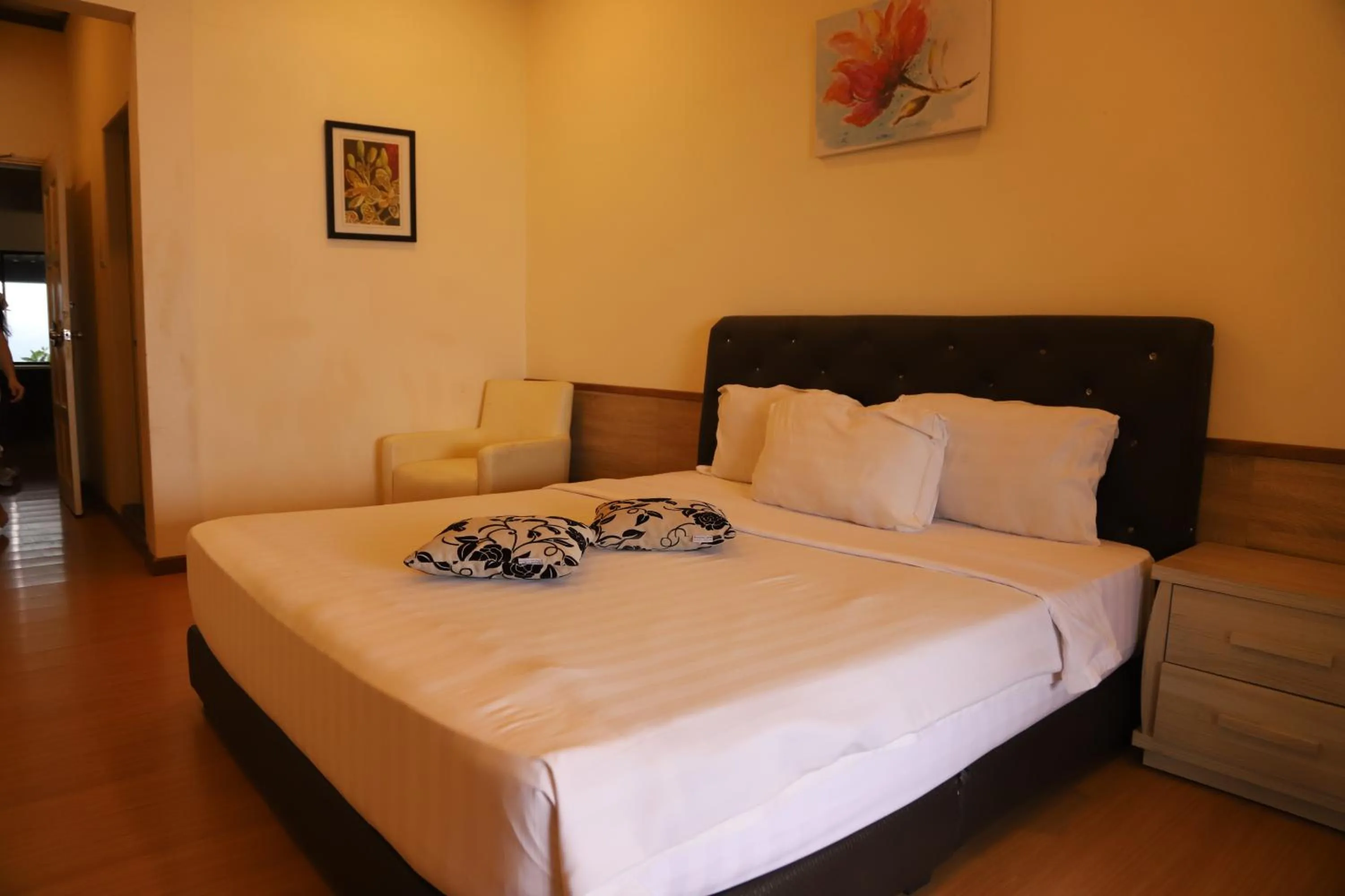 Bed in Kasih Sayang Hill Resort