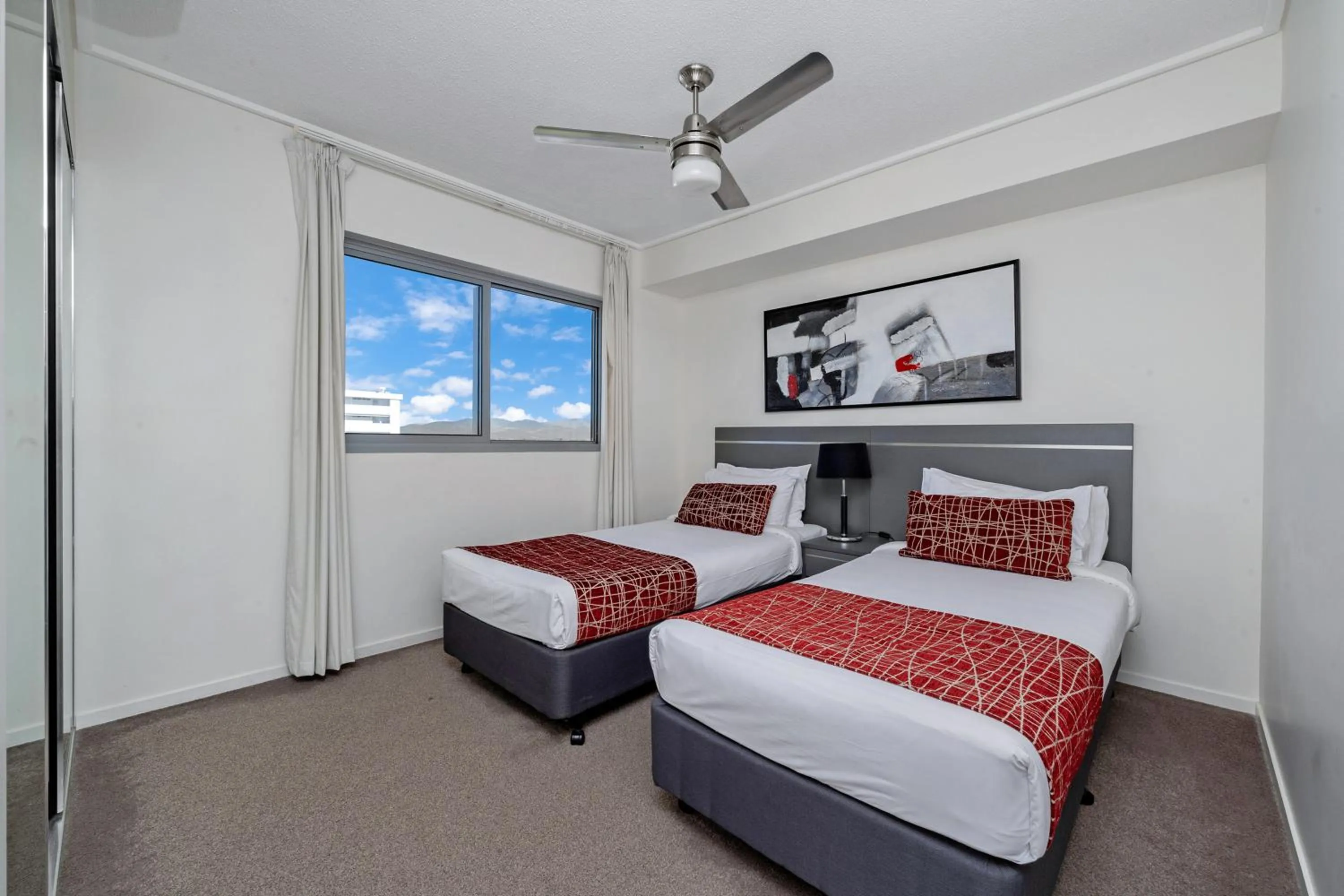 Bed in Central Kensington Apartments