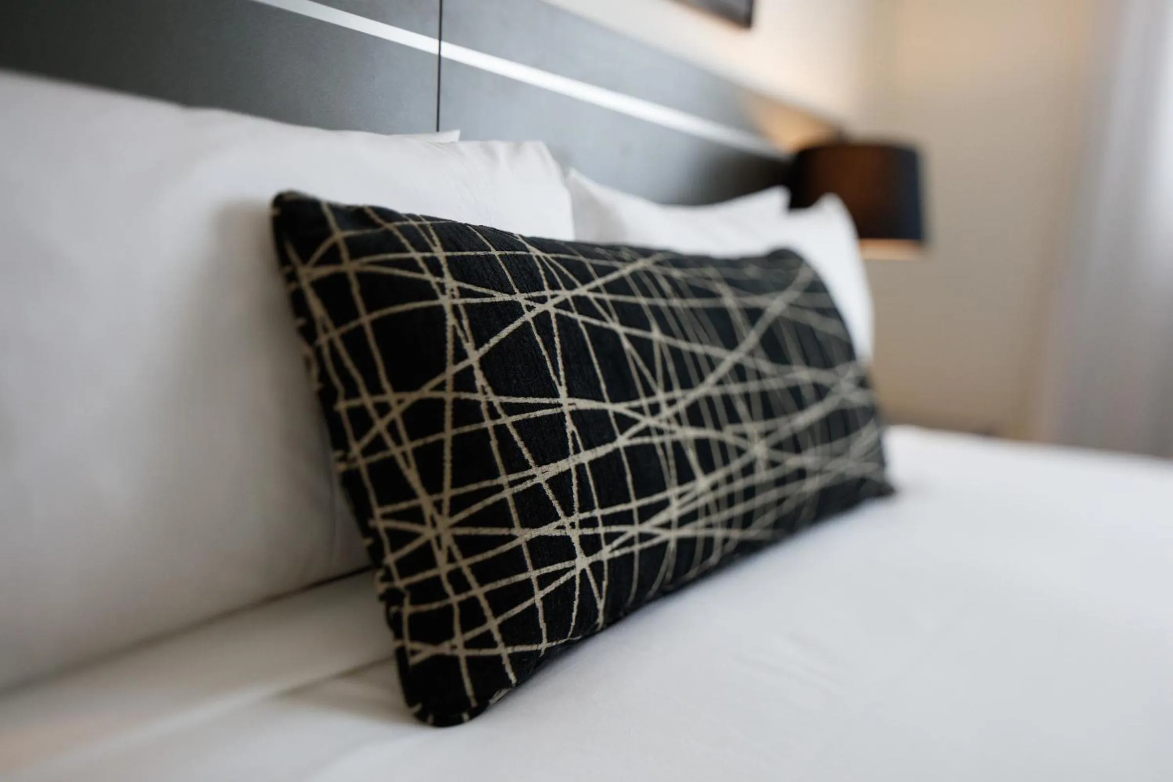 Bed in Central Kensington Apartments