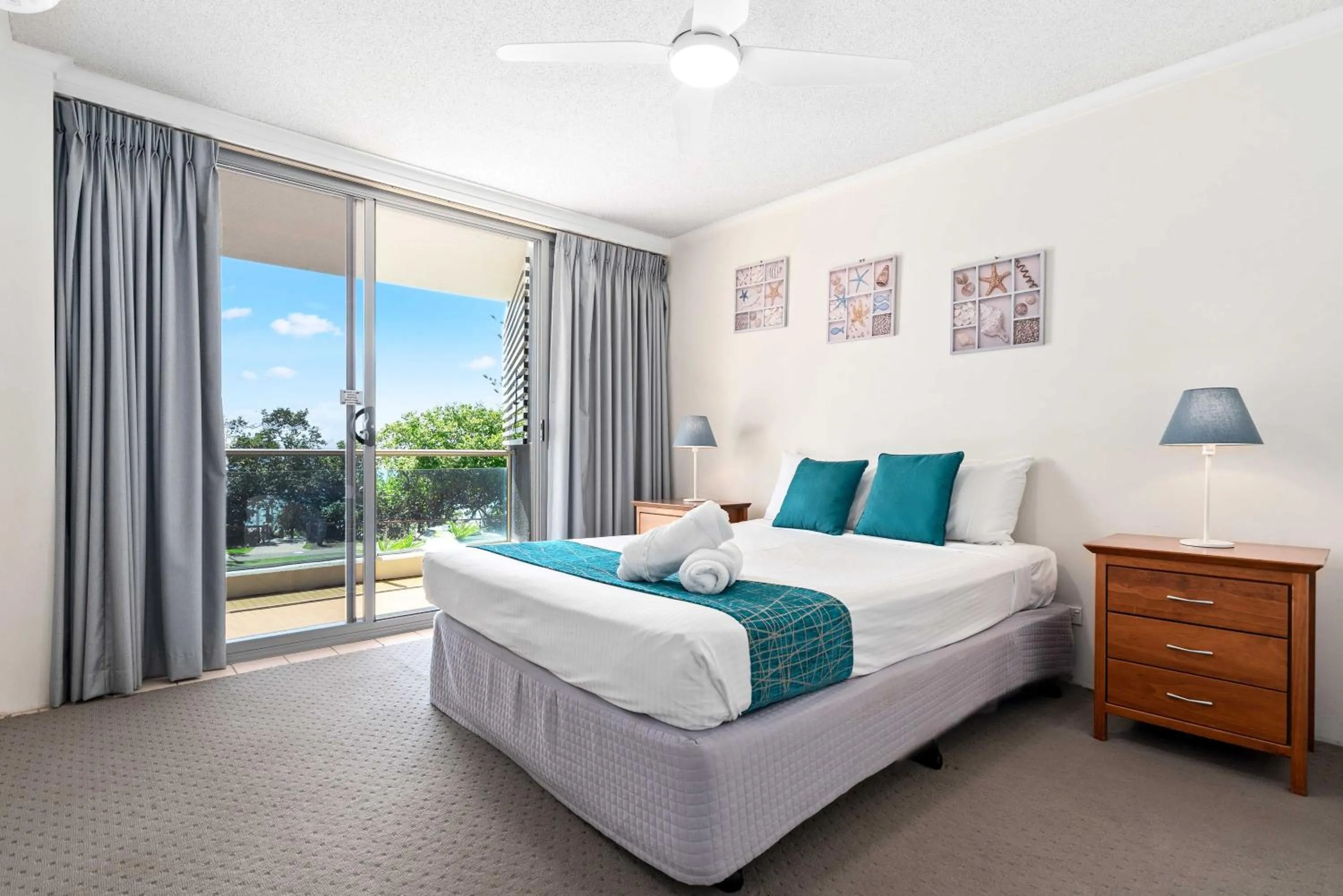 Bed in Northwind Beachfront Apartments