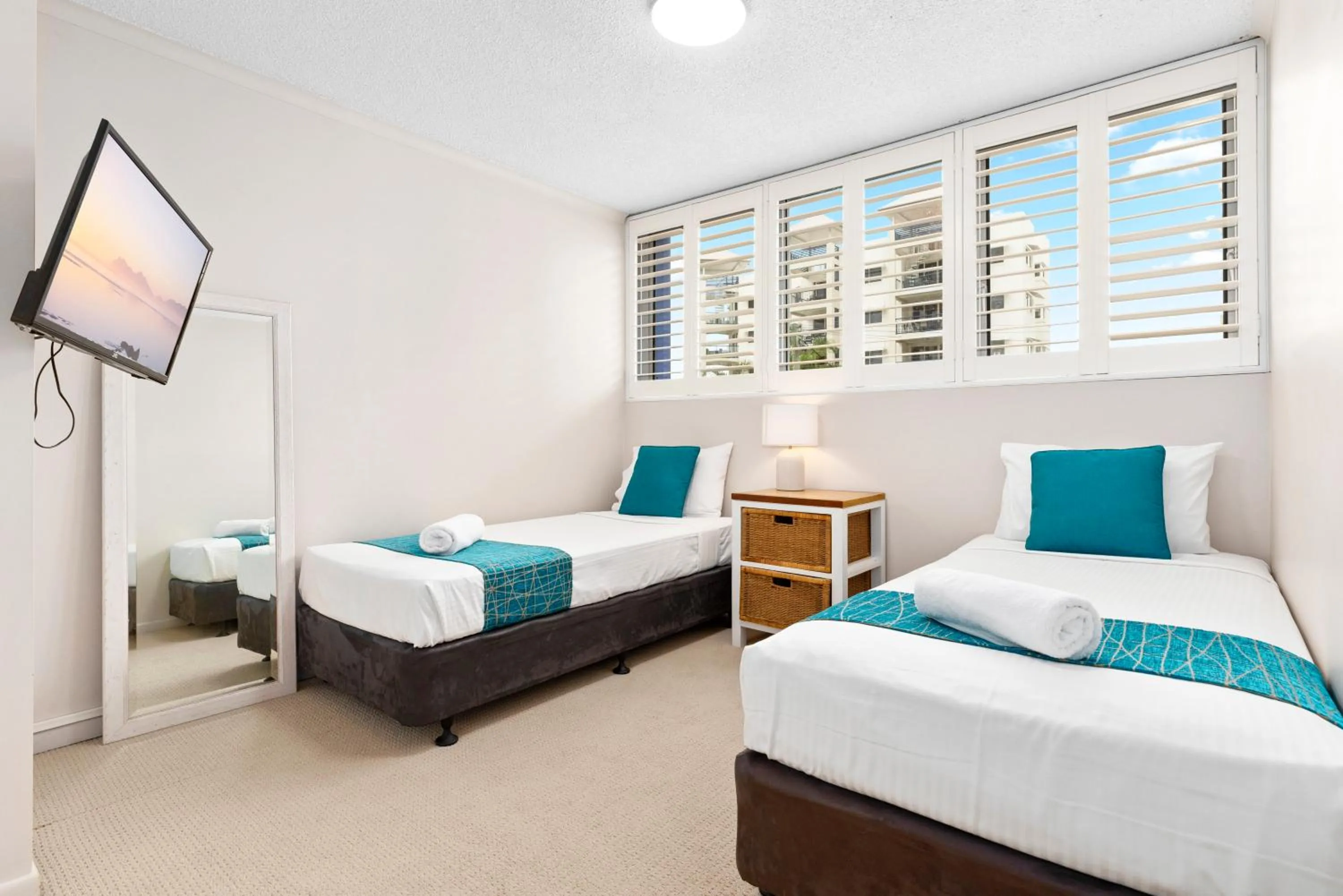 Bed in Northwind Beachfront Apartments