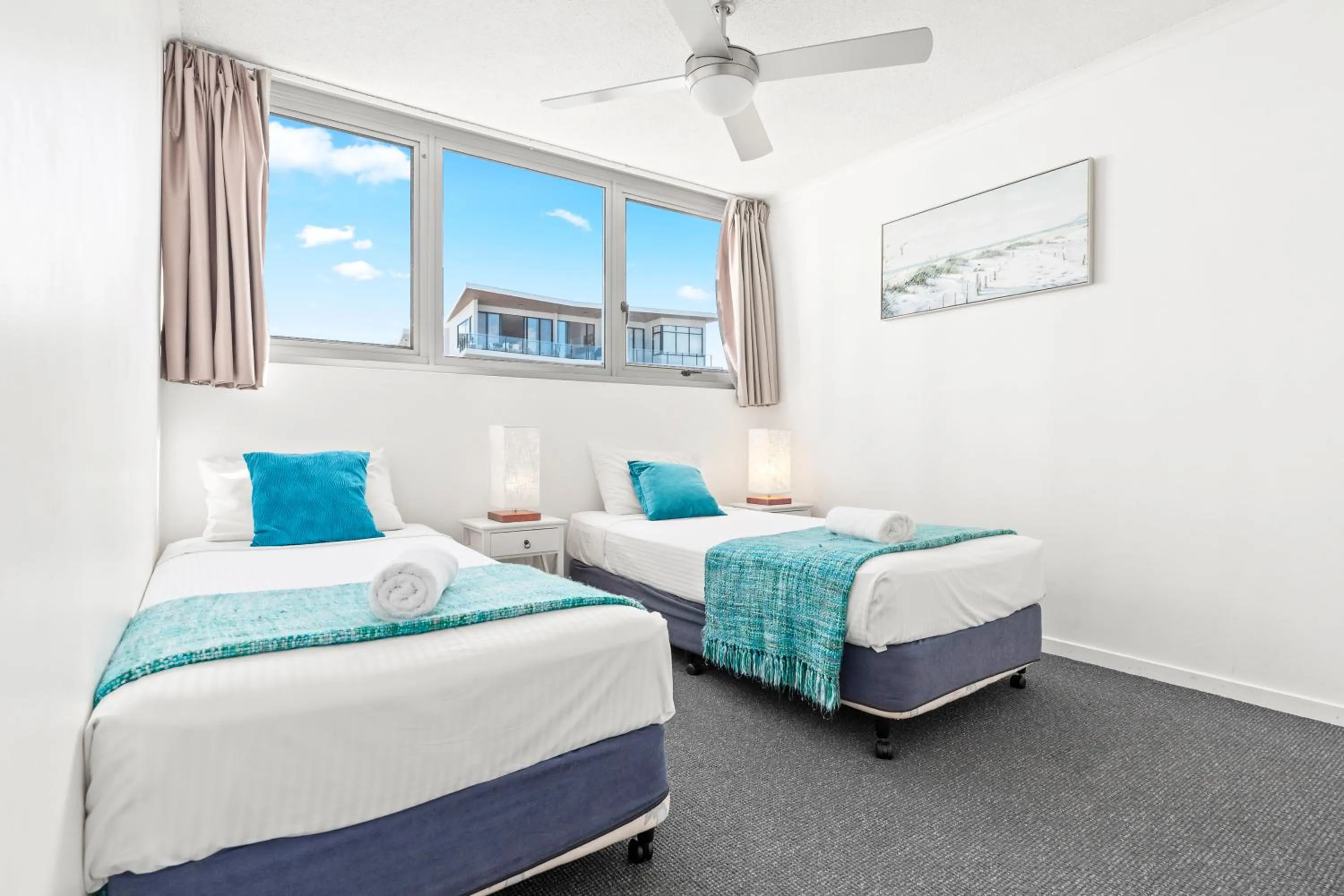 Bed in Northwind Beachfront Apartments