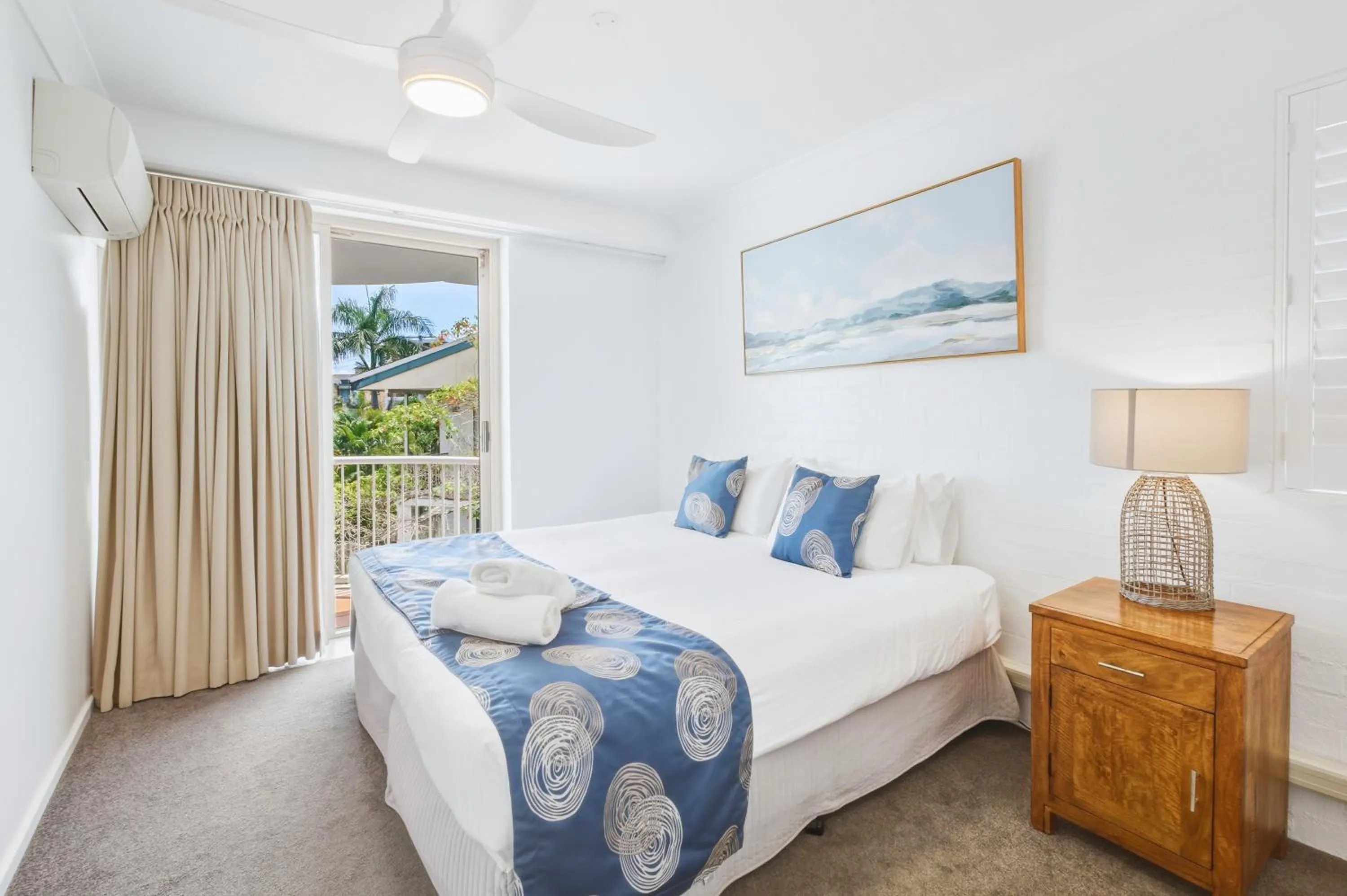 Bed in Osprey Apartments