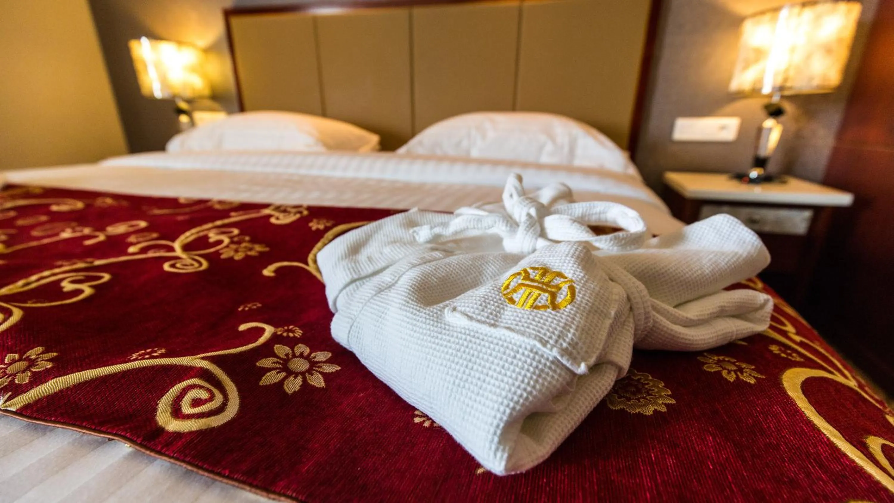 Bed in Hôtel Huatian Chinagora