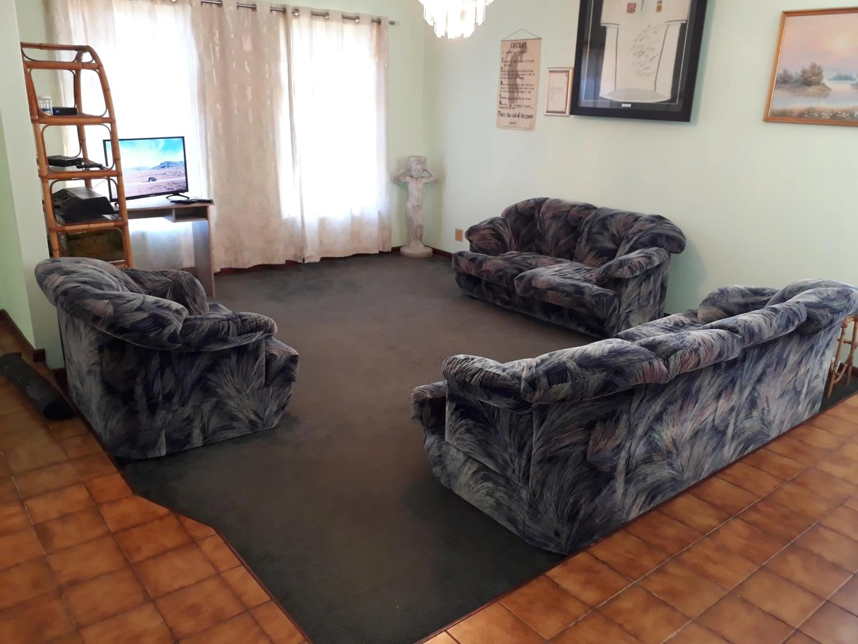 Communal lounge/ TV room in DJ'S B&B in Table View Cape Town