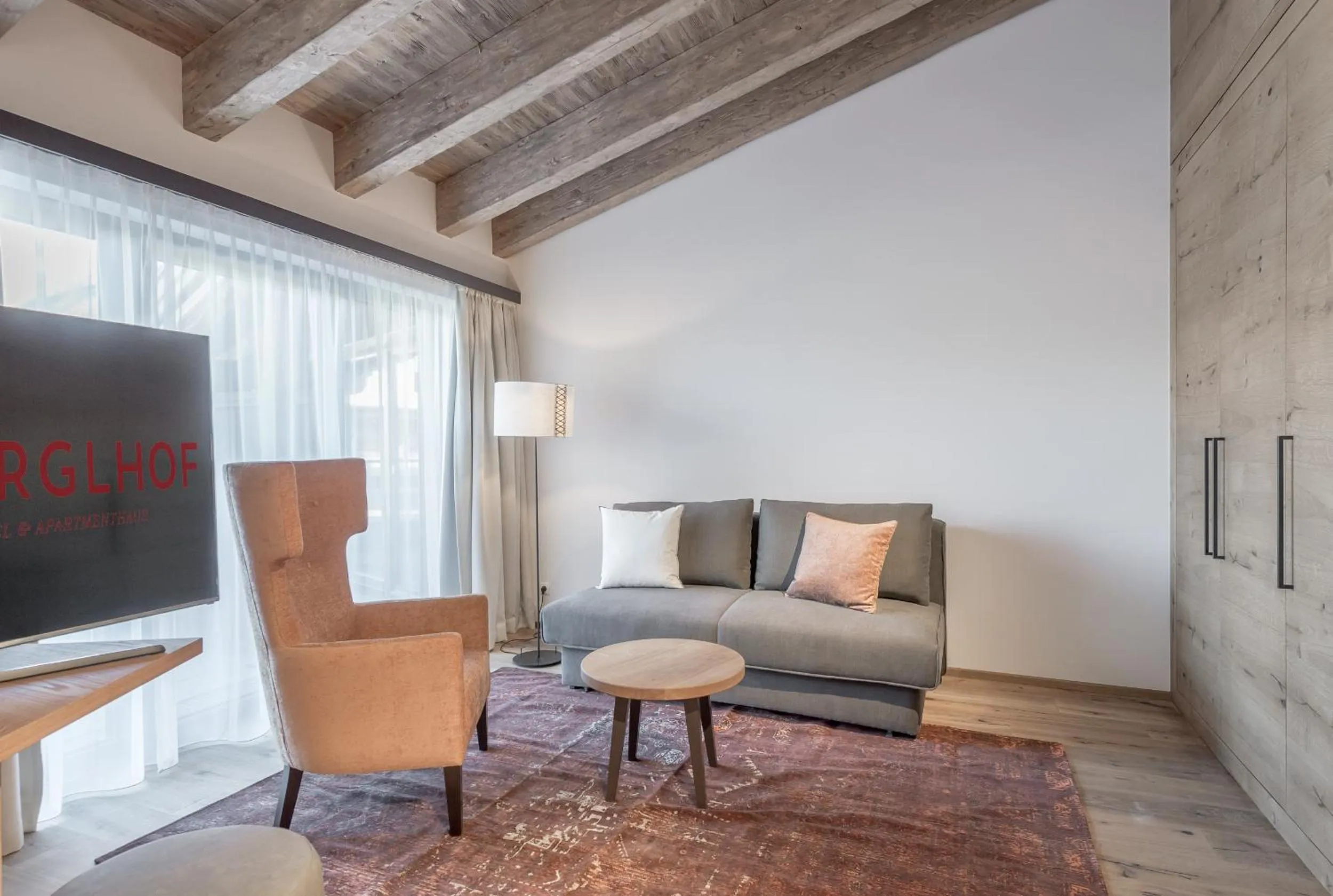 Communal lounge/ TV room in Hotel Gurglhof Superior