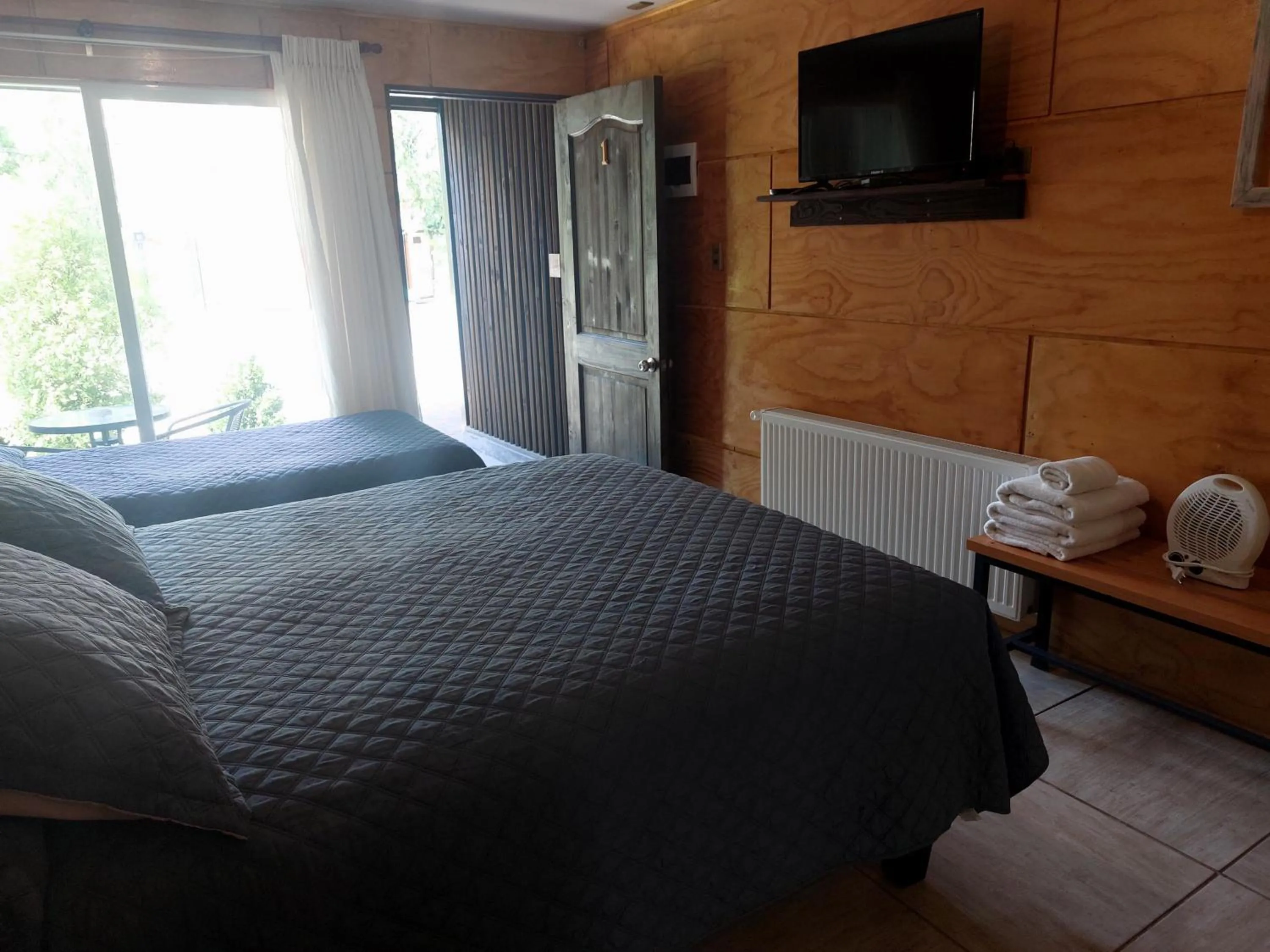 Bed in Verdevida Apart Hotel