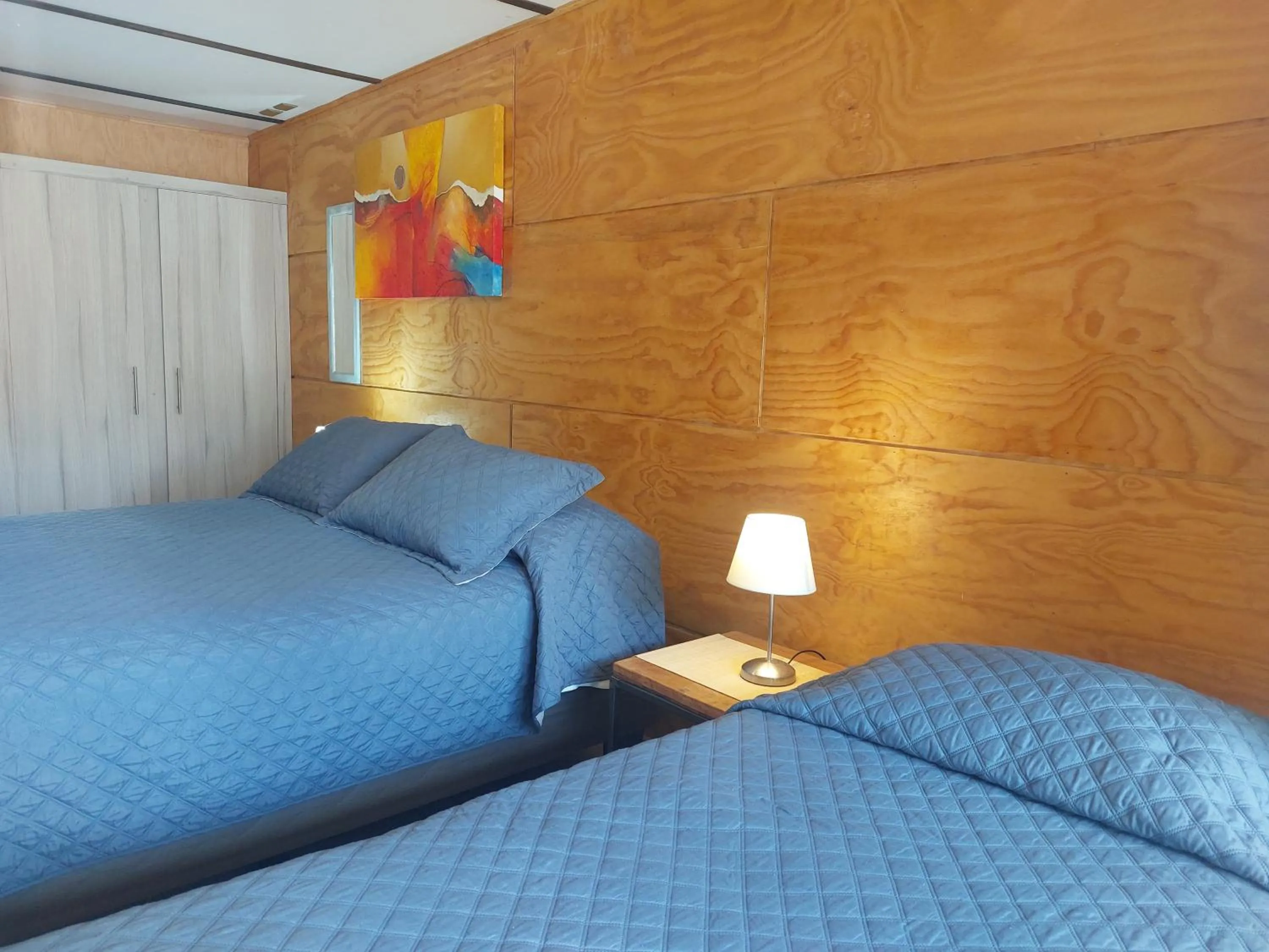 Bed in Verdevida Apart Hotel