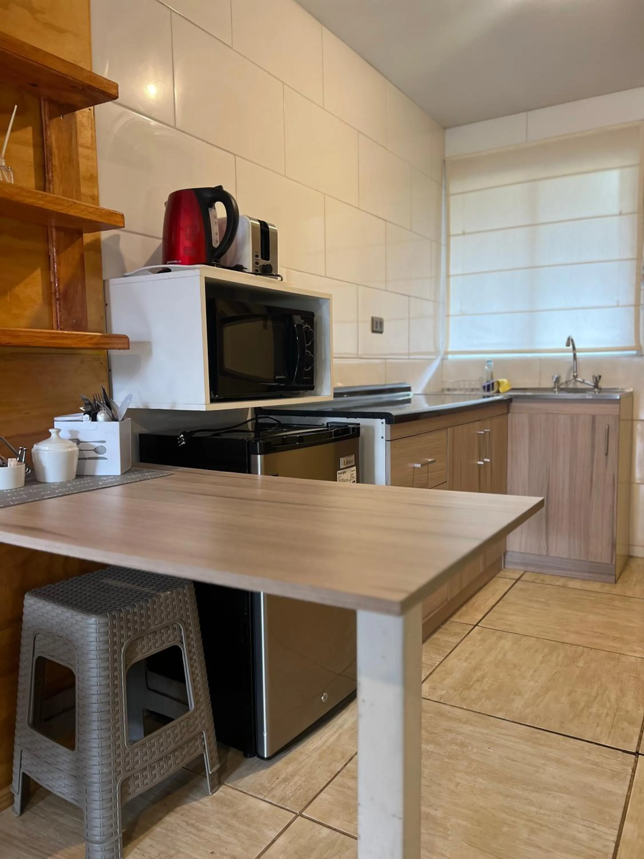 Kitchen or kitchenette in Verdevida Apart Hotel