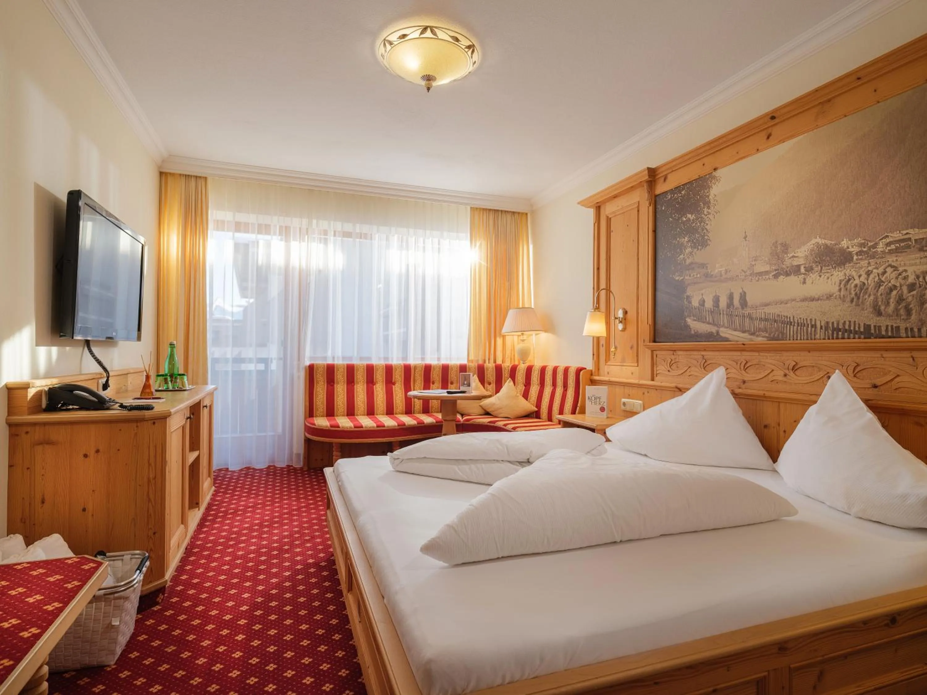 Photo of the whole room, Bed in Hotel Alpina Wellness & Spa Resort