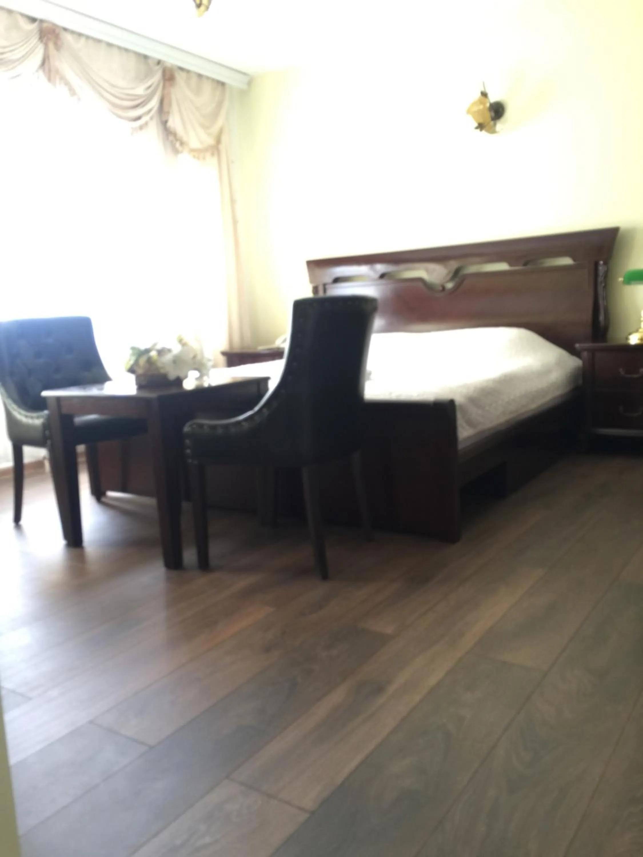 Seating area, Bed in Hotel Adria