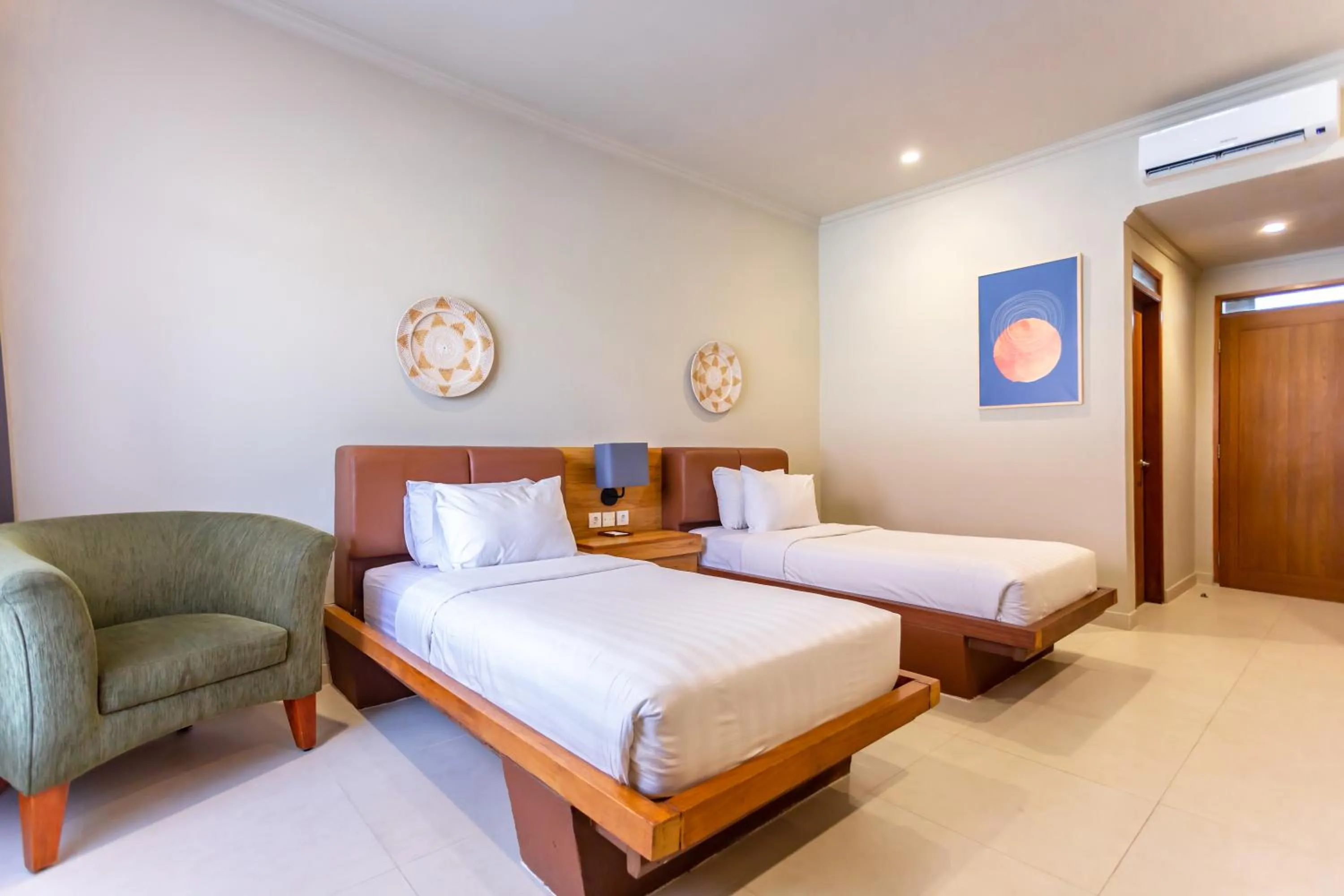 Bed in Mutiara Bali Boutique Resort & Villa