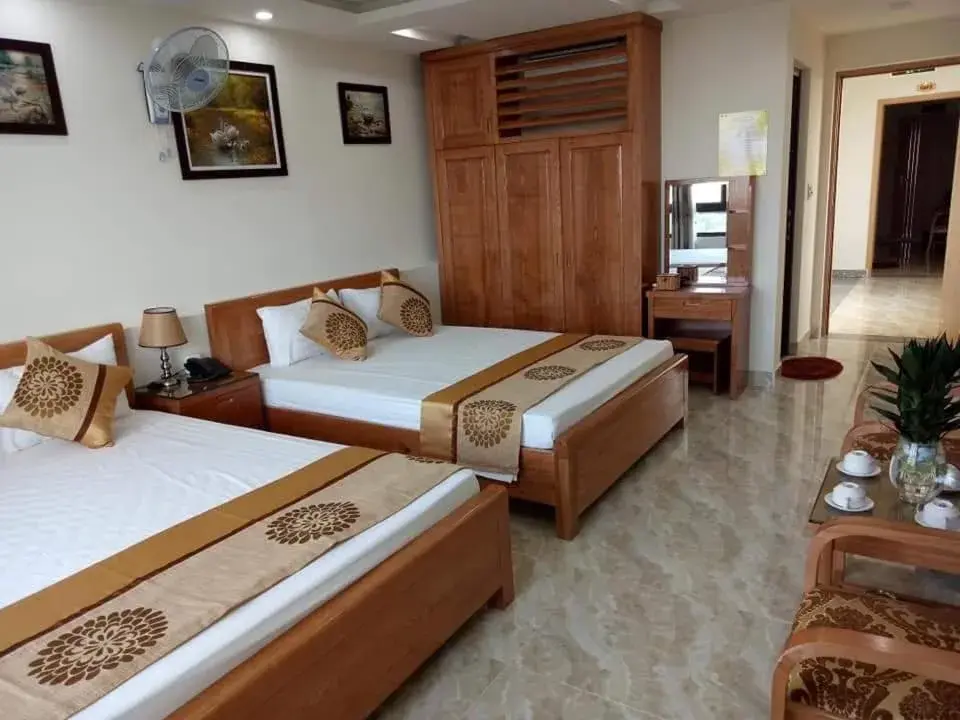 Deluxe Queen Room with Two Queen Beds in Royal Hotel Deluxe Queen Room with Two Queen Beds in Royal Hotel