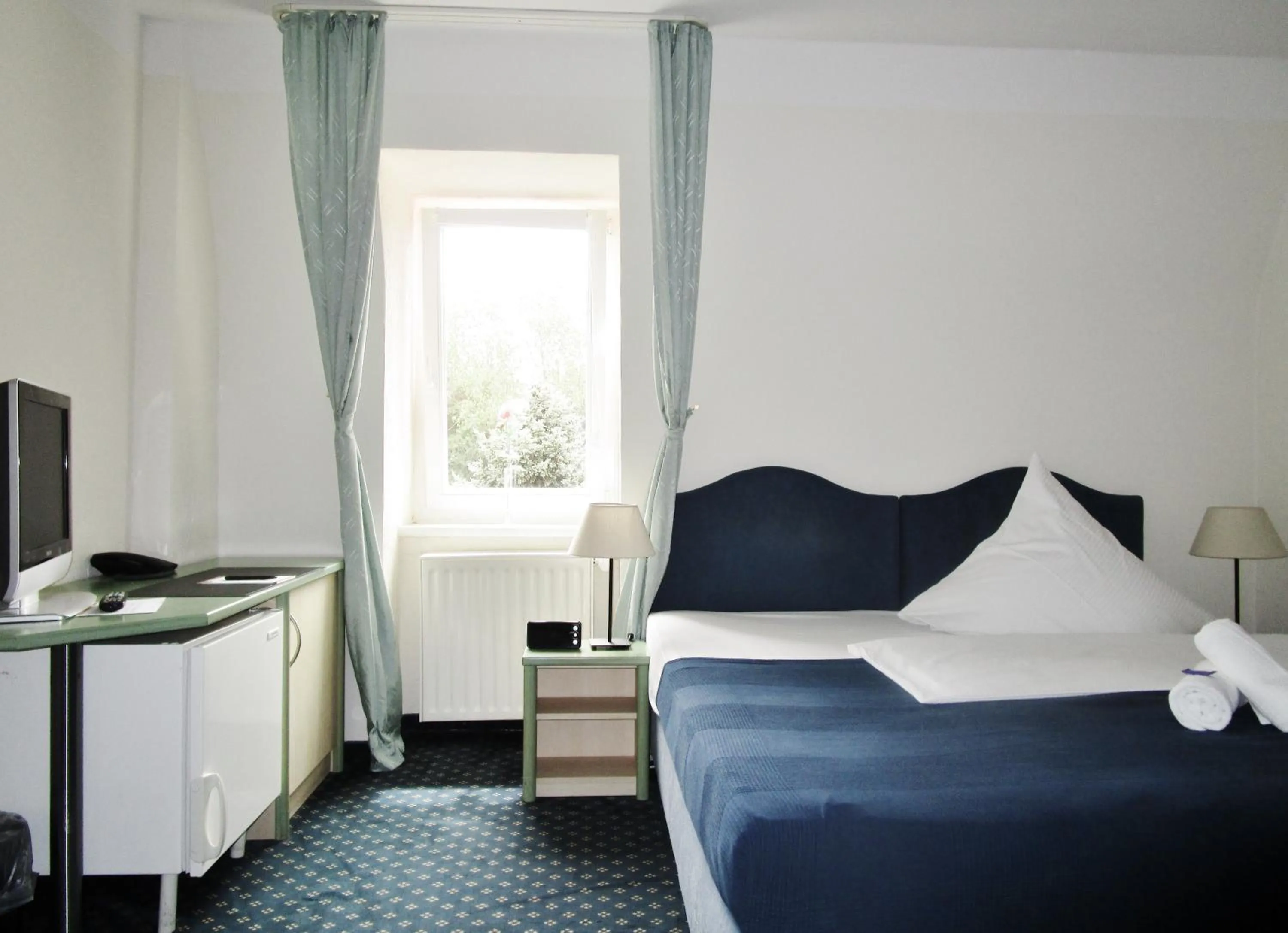 Photo of the whole room, Bed in Hotel Ostseestern