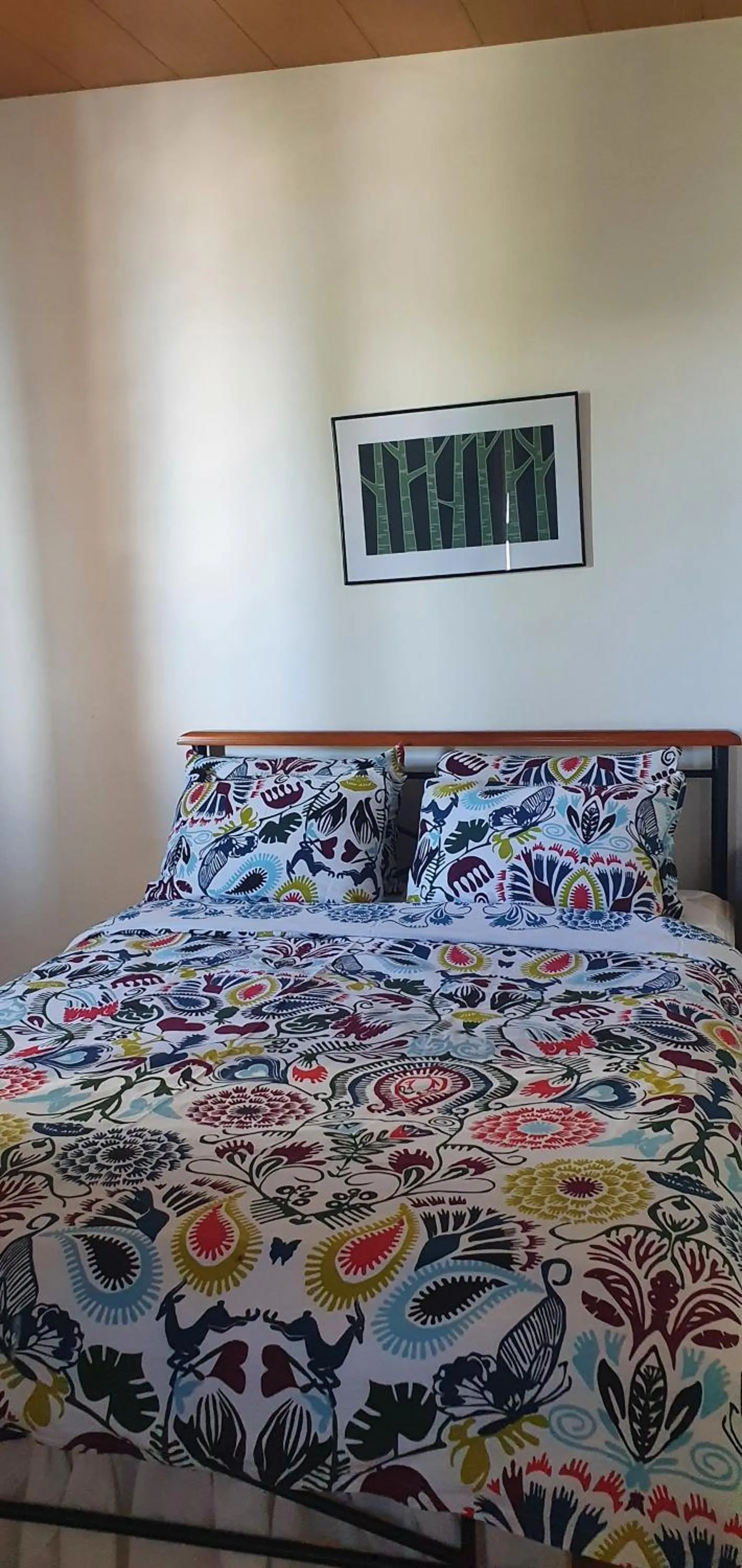 Bed in Lola's Guest House