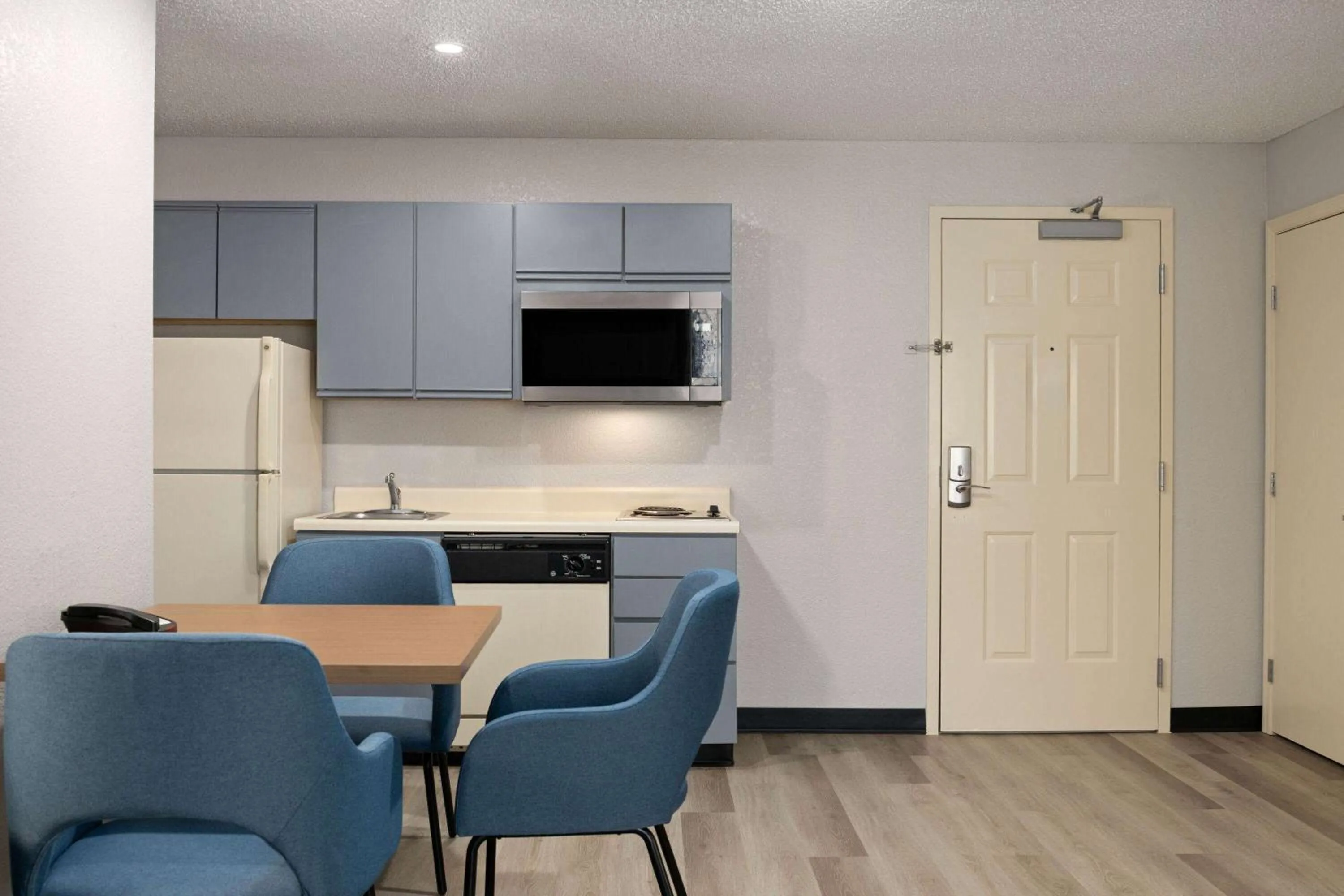 Photo of the whole room in Days Inn & Suites by Wyndham Green Bay WI