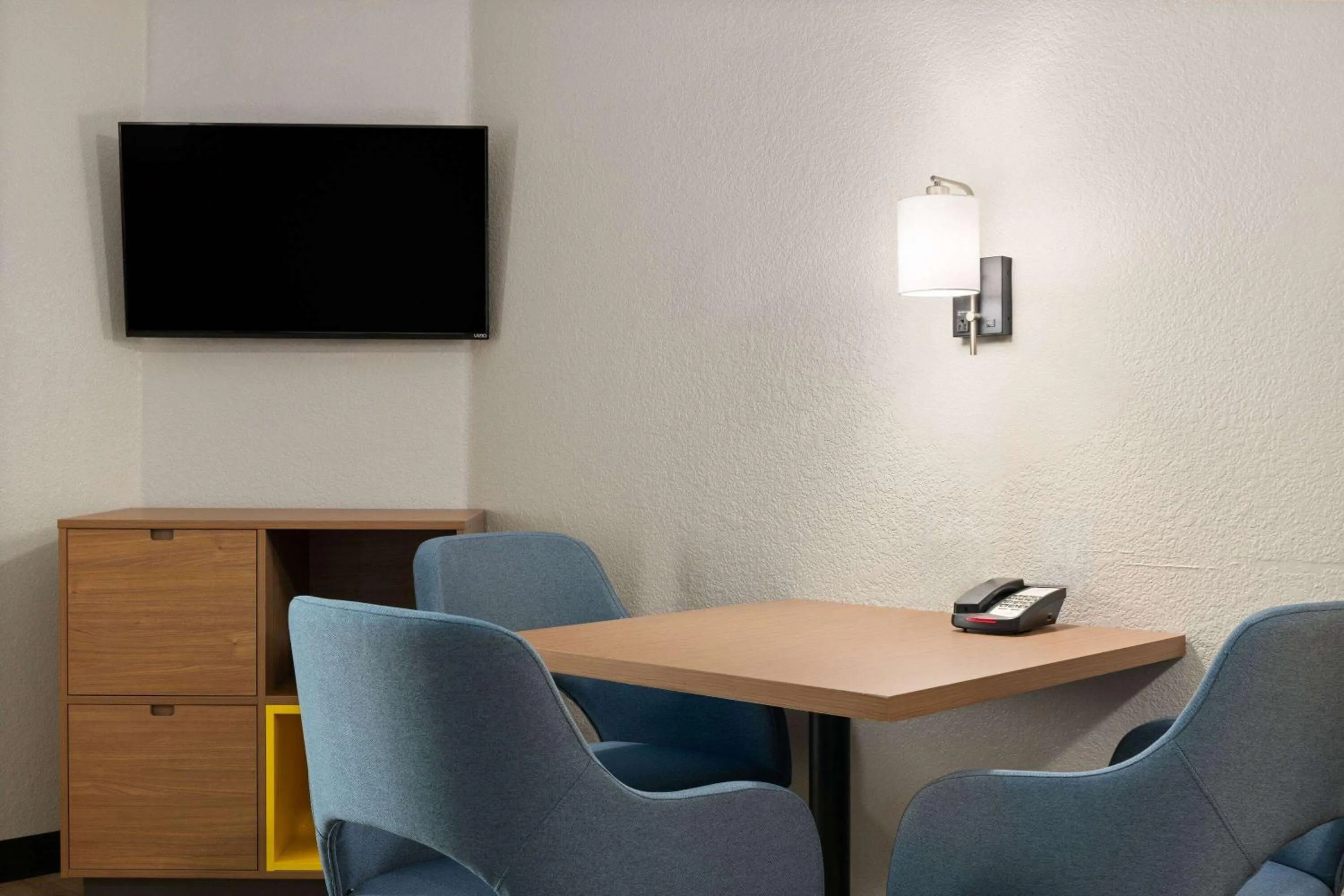 Photo of the whole room in Days Inn & Suites by Wyndham Green Bay WI