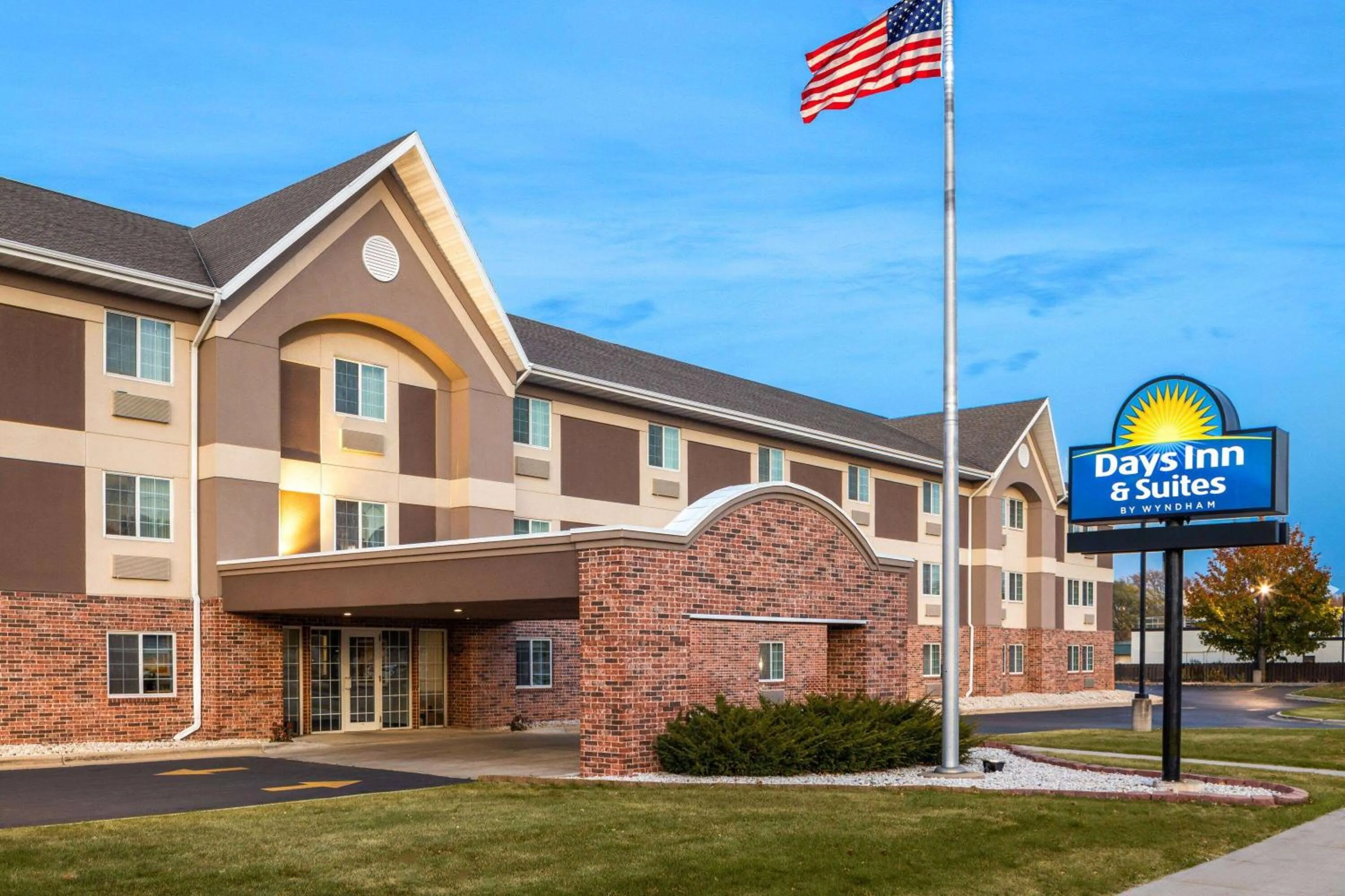 Property building in Days Inn & Suites by Wyndham Green Bay WI