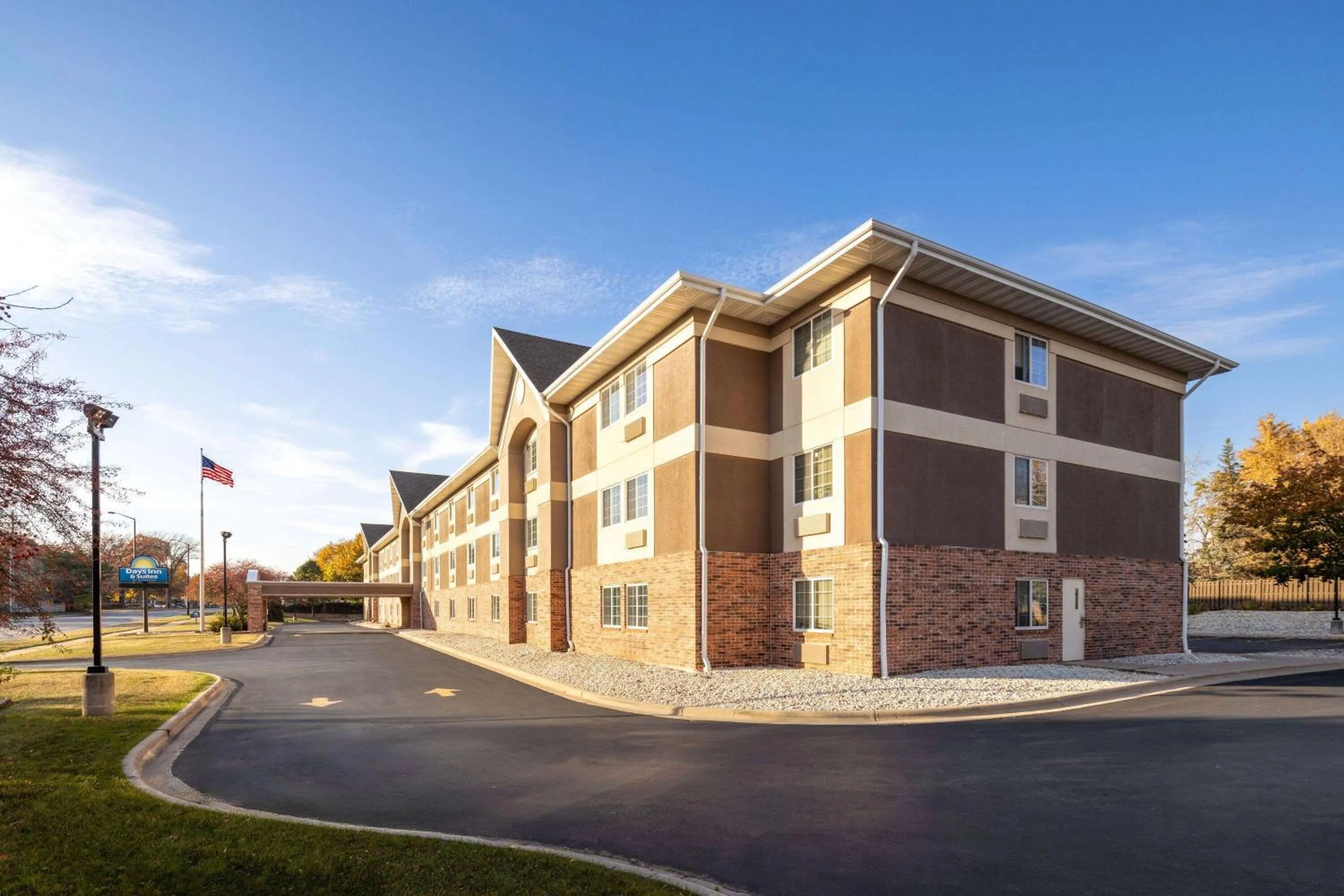 Property building in Days Inn & Suites by Wyndham Green Bay WI