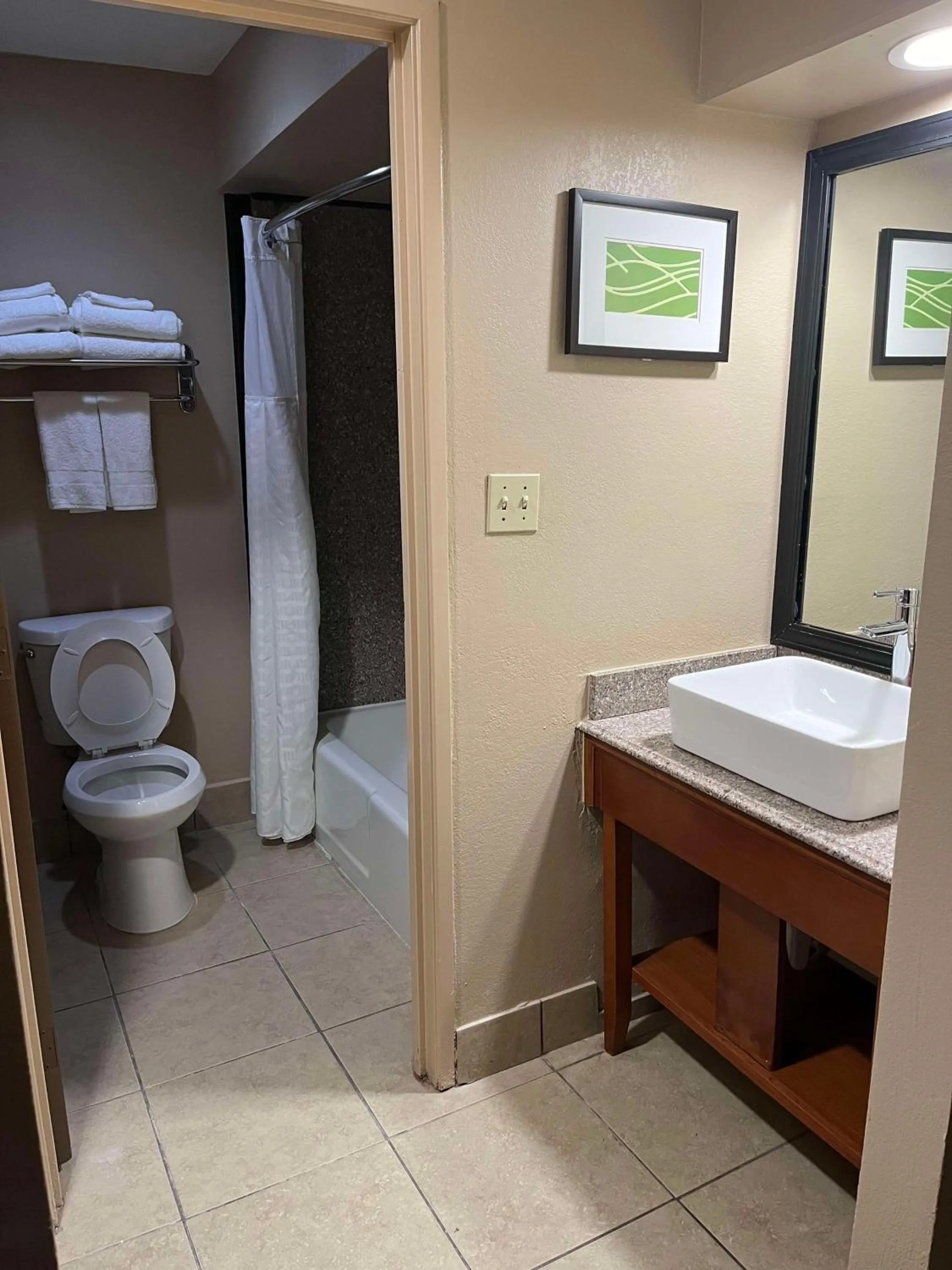 Bathroom in SureStay Plus by Best Western Mobile I-65