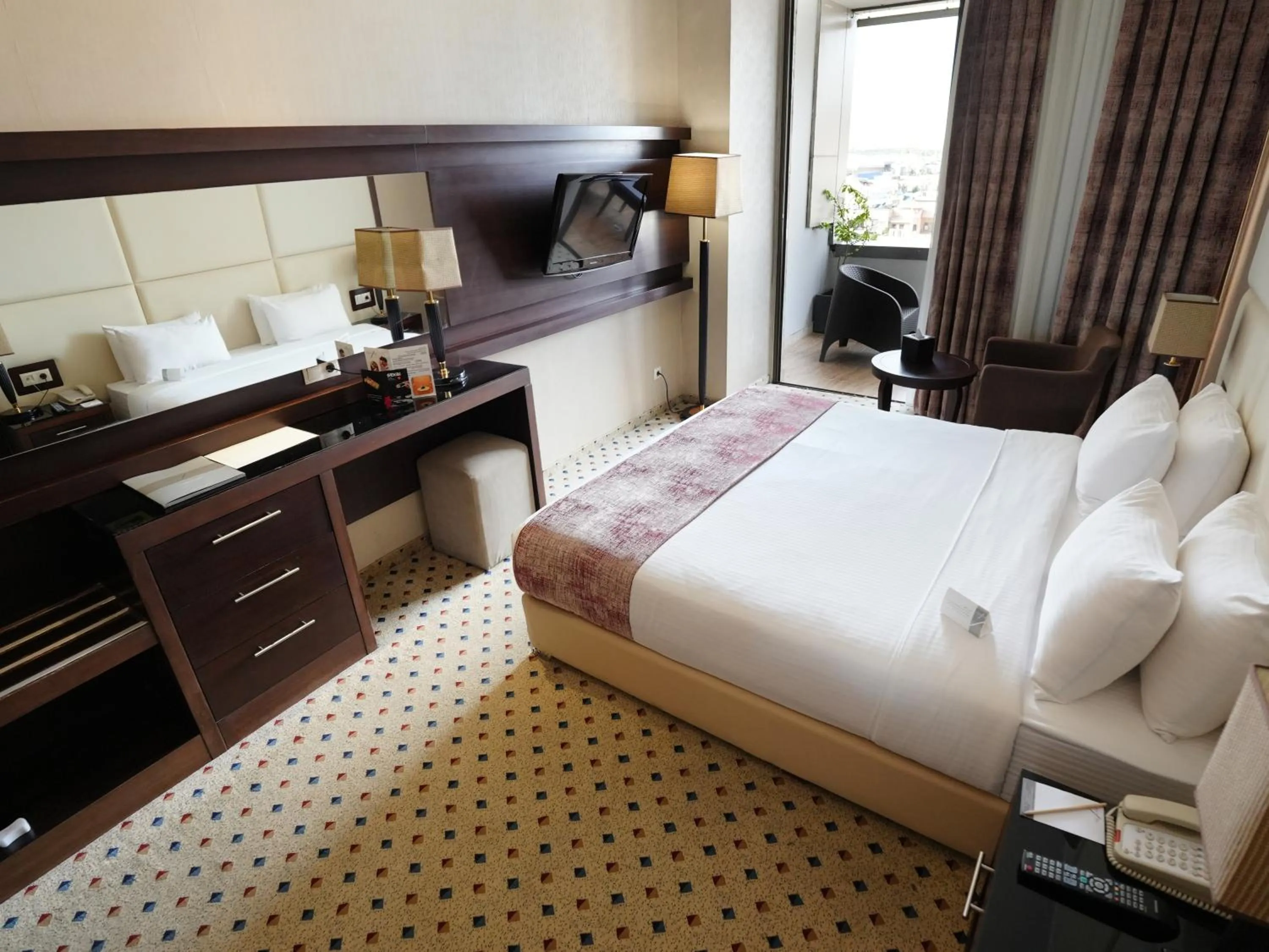 Bed in Canyon Hotel Erbil