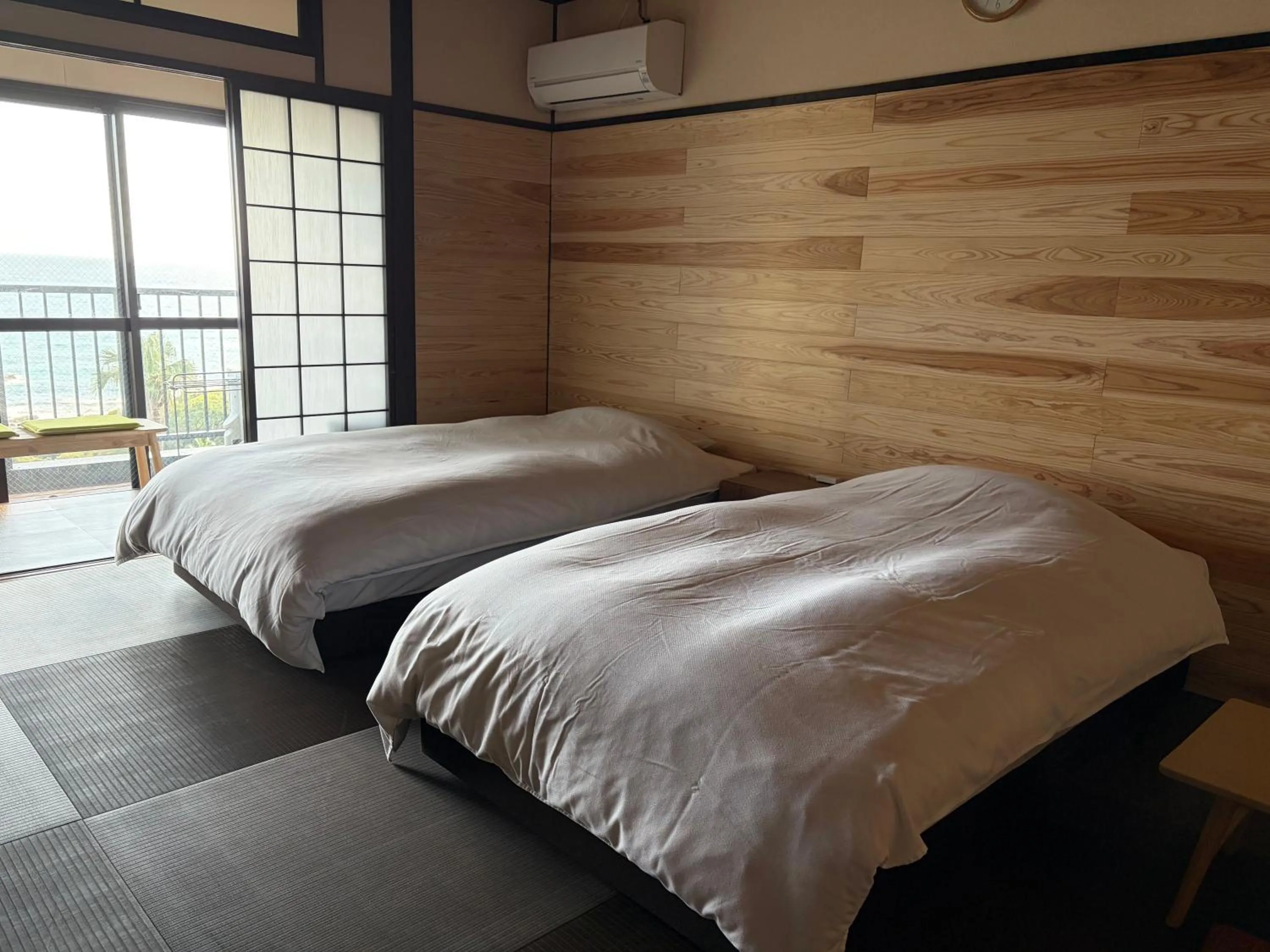 Bed in Yakushima Green Hotel