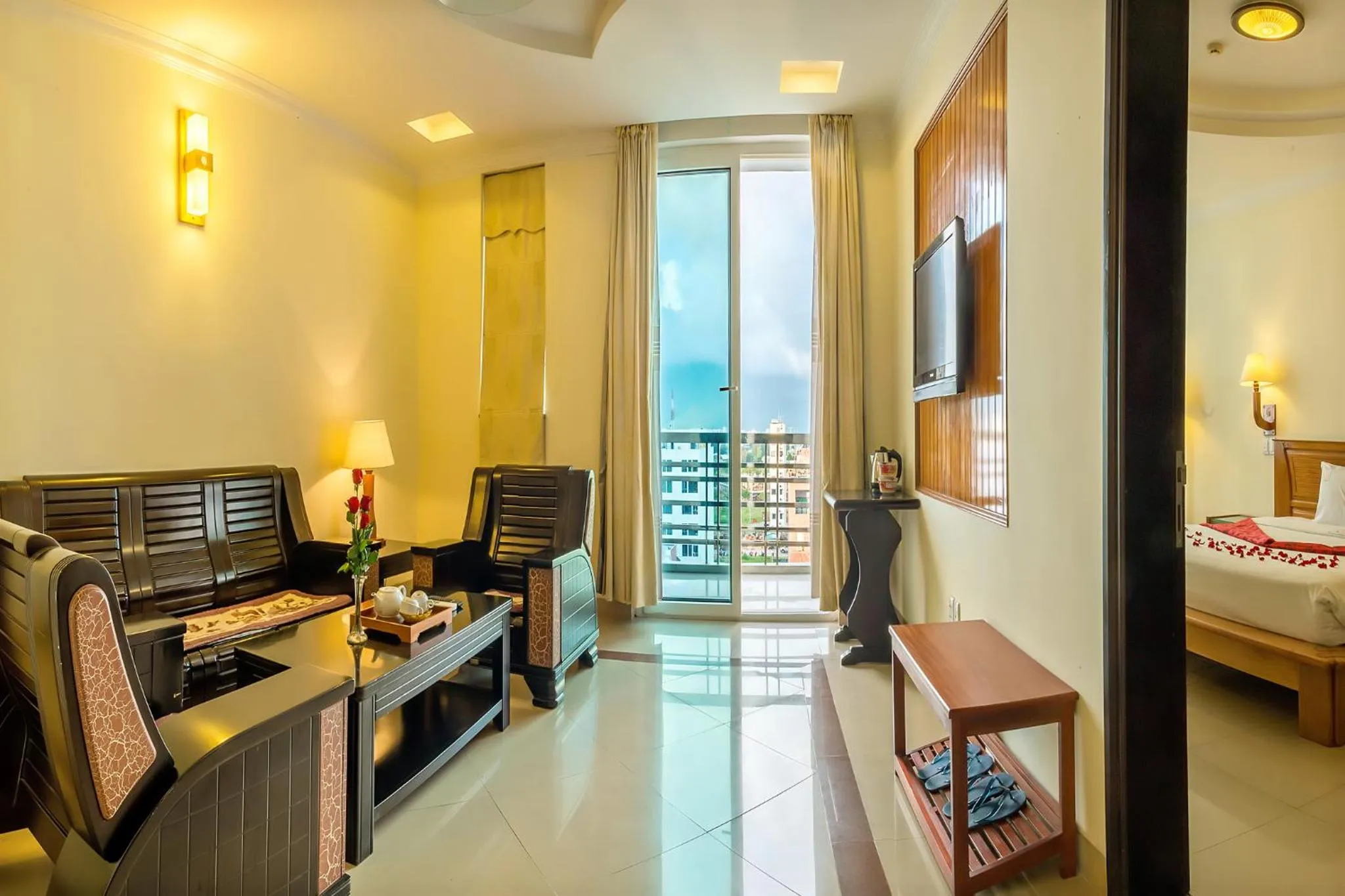 Living room, Bed in Golden Sea Hotel Da Nang