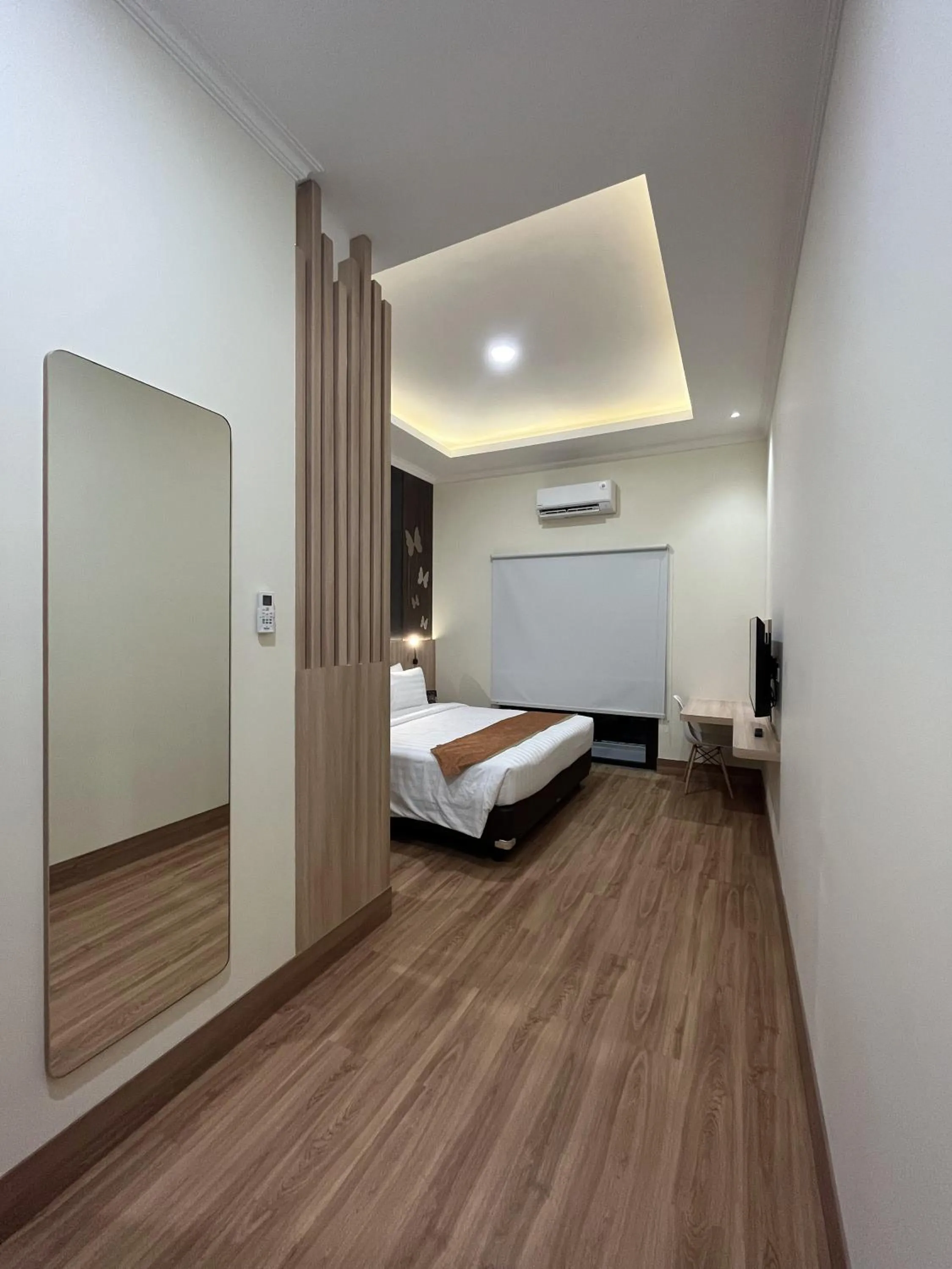 Bed in D'Bamboo Suites