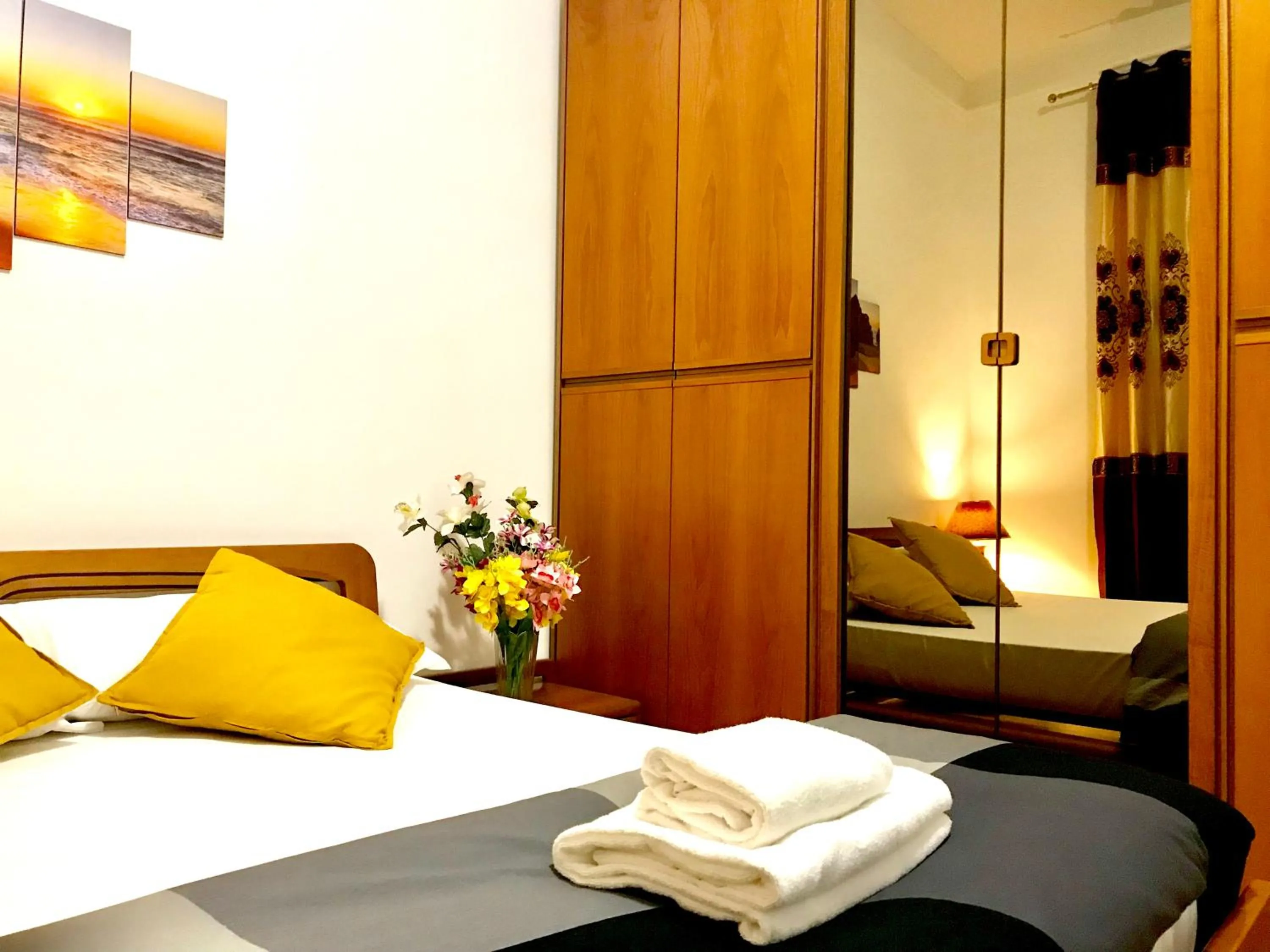 Bed in COLOSSEUM LUXURY ROOM