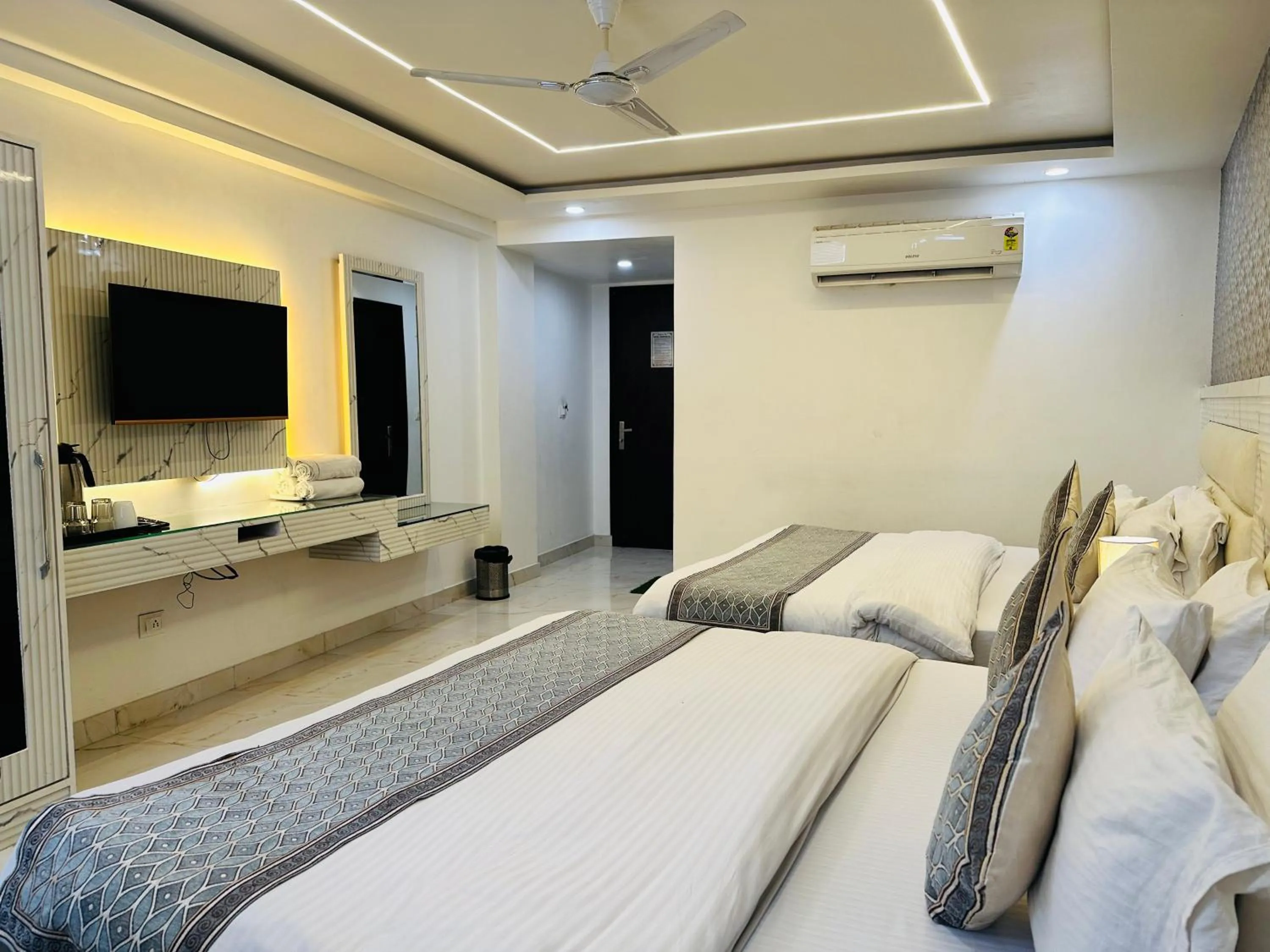 Photo of the whole room, Bed in Hotel Krishna Deluxe-By RCG Hotels