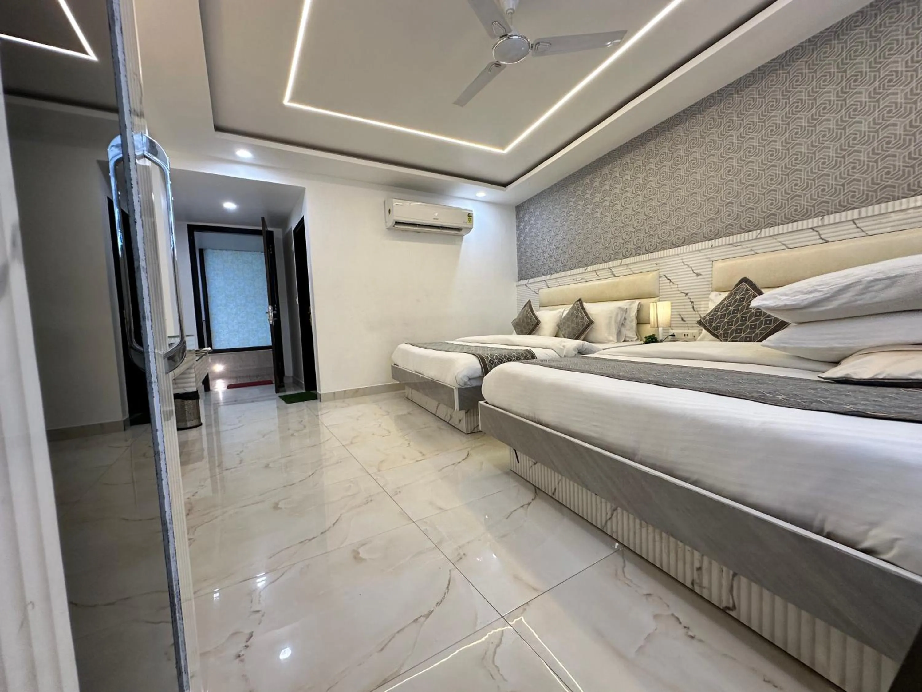 Photo of the whole room, Bed in Hotel Krishna Deluxe-By RCG Hotels