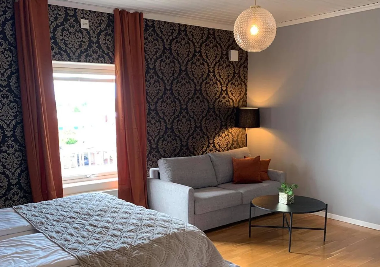 Living room, Bed in Hotell Ronja