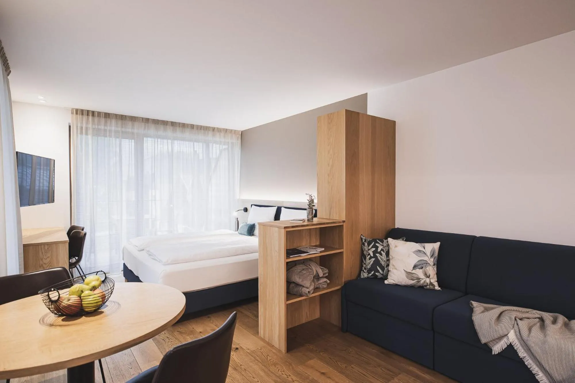 Photo of the whole room, Bed in Residence Nives