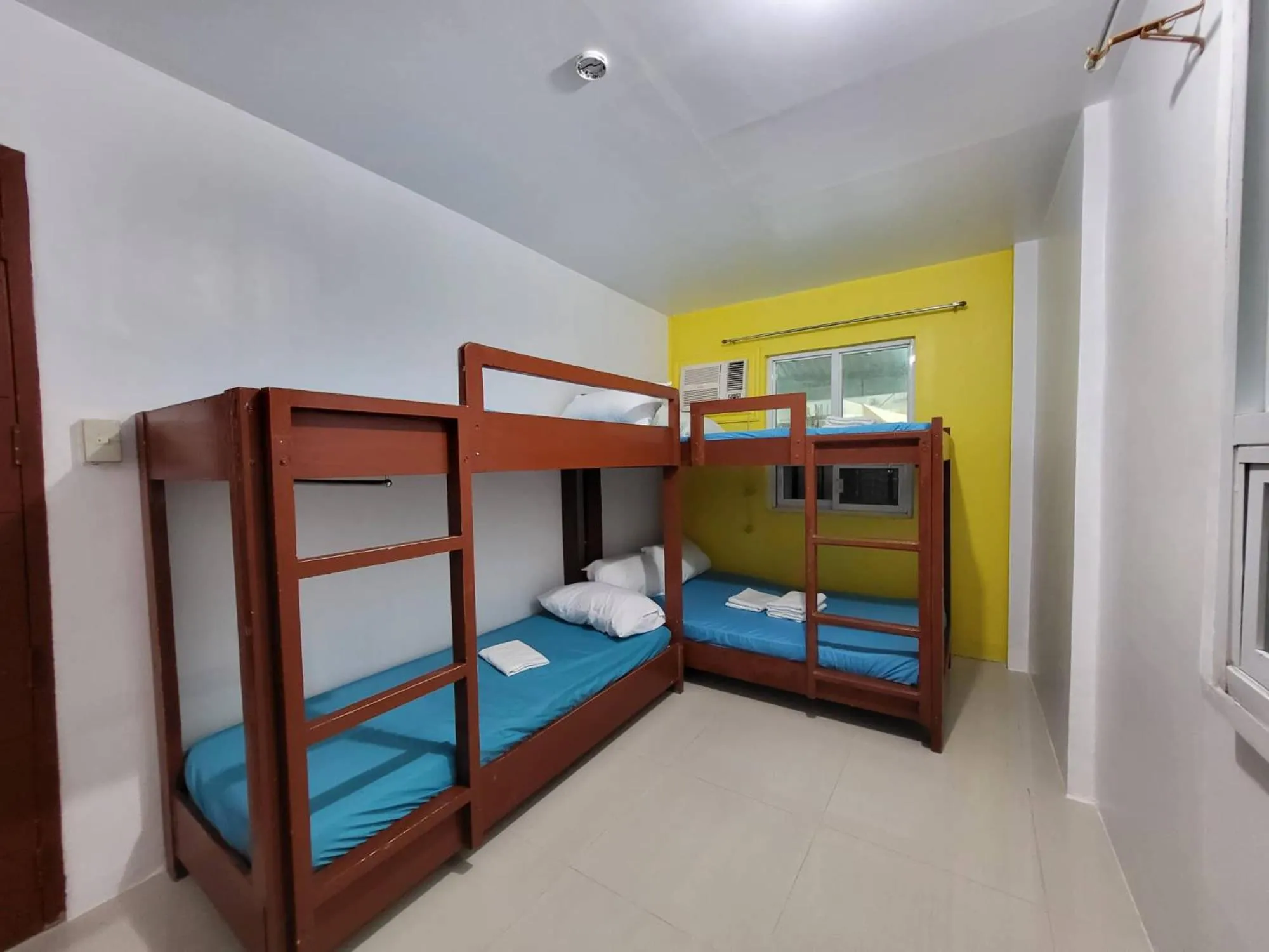 Photo of the whole room, Bed in Wendy's Apartelle