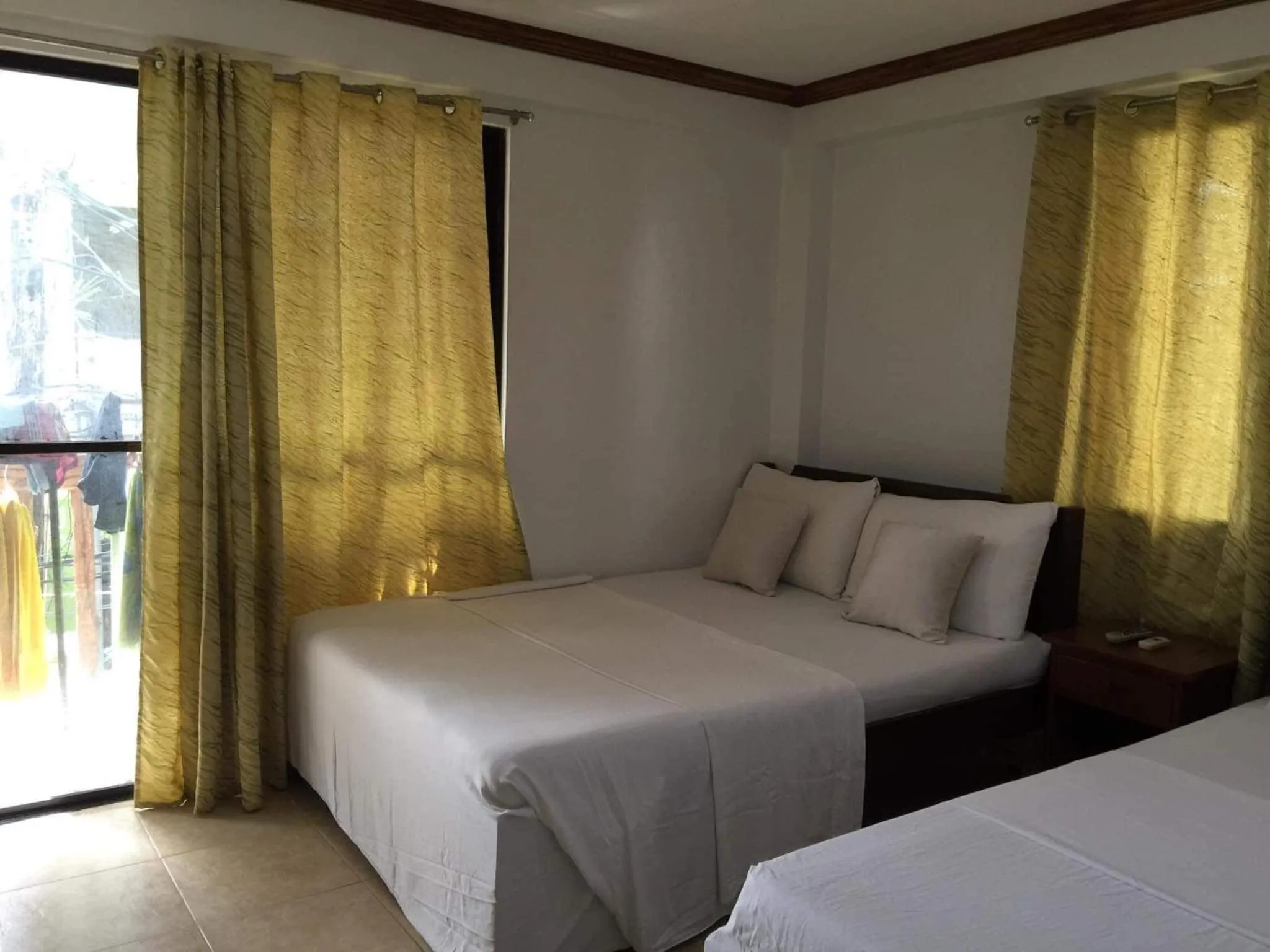 Bed in Double Diamond Inn Guest House