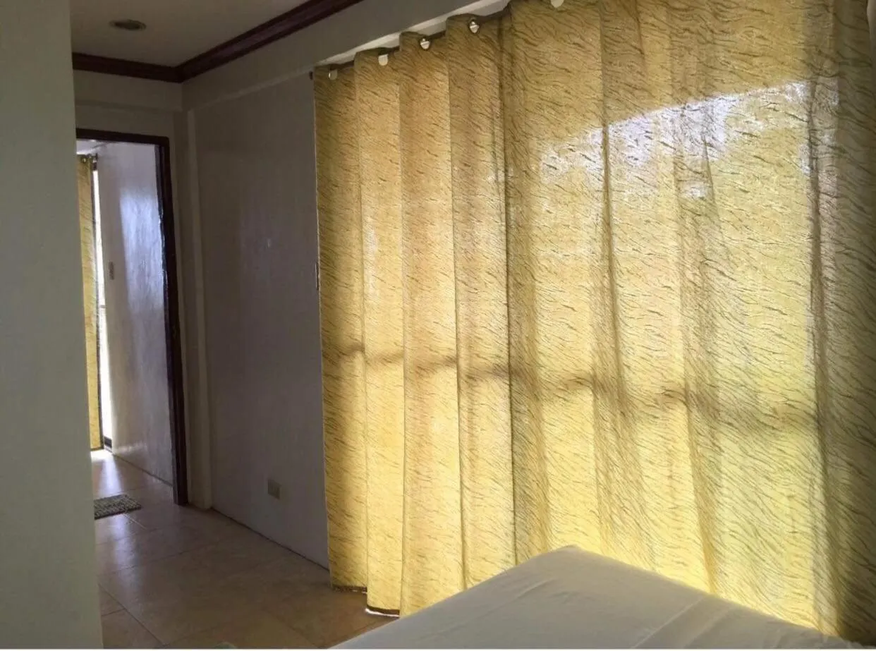 Bed in Double Diamond Inn Guest House