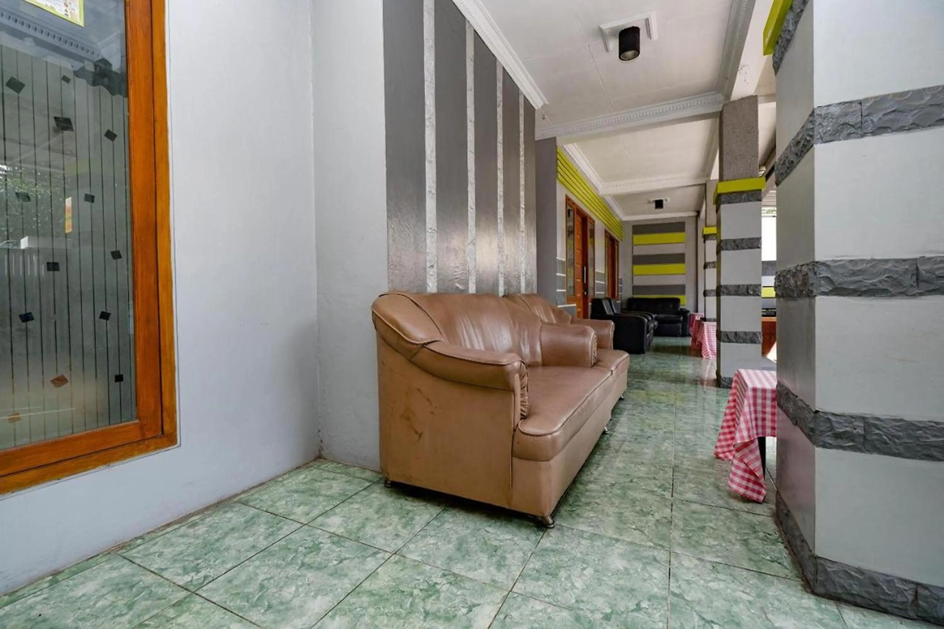 Communal lounge/ TV room in Griya Sakura Syariah near UMS